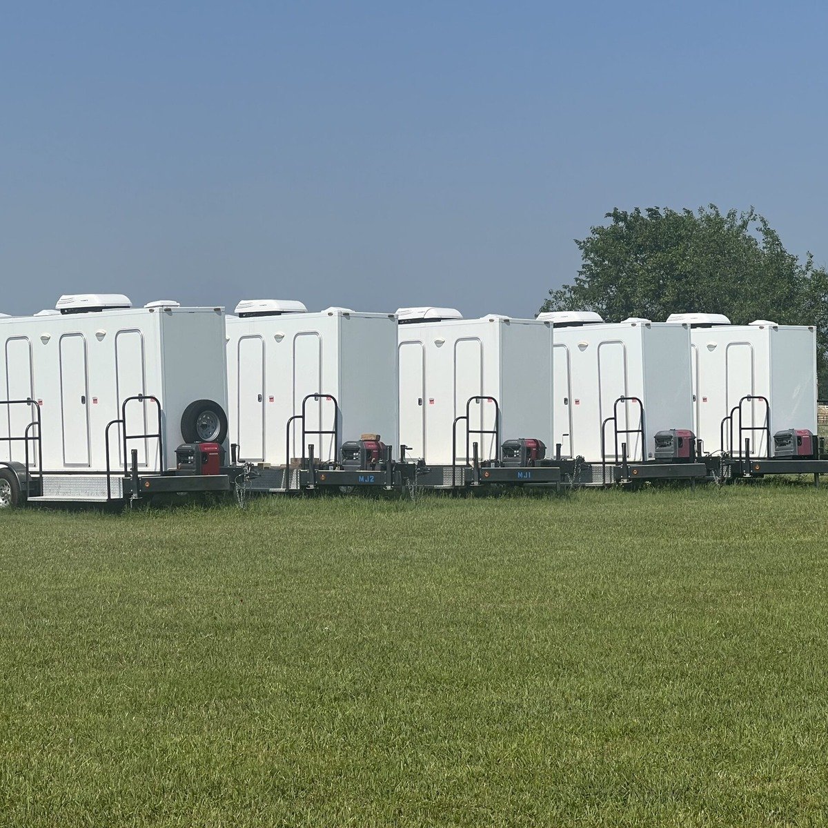 Portable toilets supporting sanitation at a coastal project for construction toilets and fencing near me in Coral Springs, FL.
