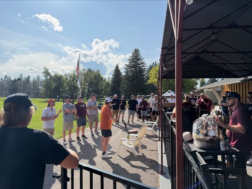 Former players gathered outside the clubhouse at the Hack