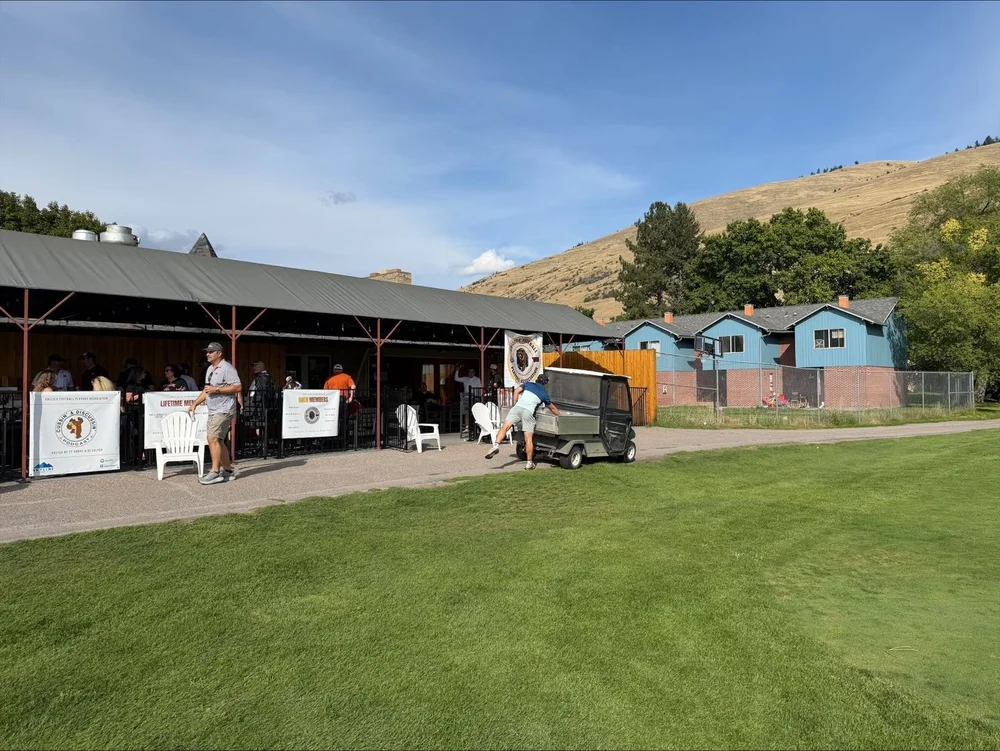 The University Golf Course clubhouse with Mount Sentinel behind it