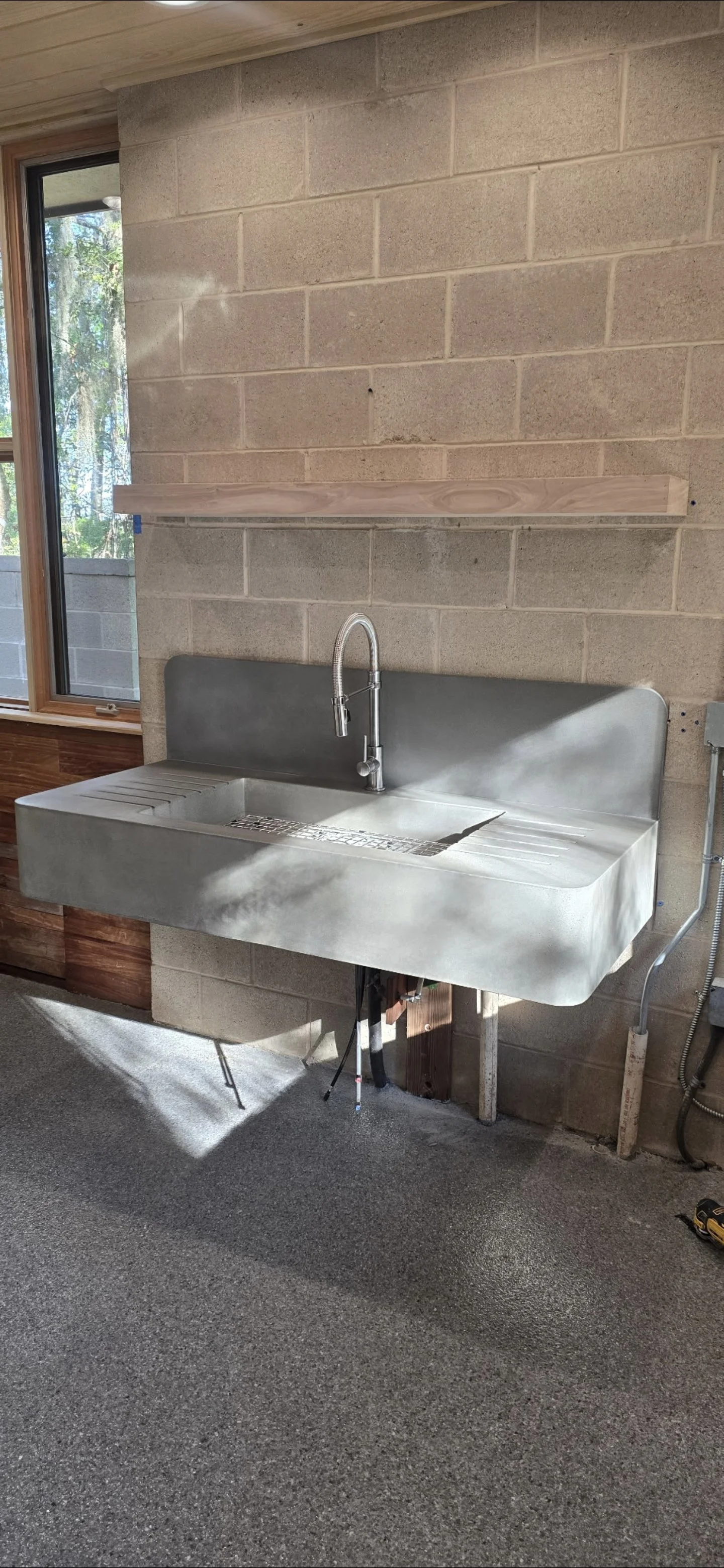 West Utility Sink installed with integral backsplash and grooved drainboards