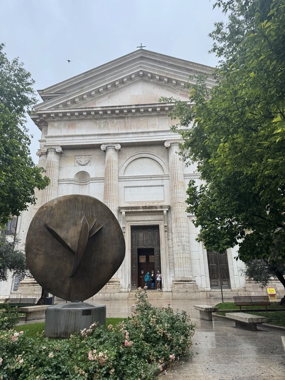 Chiesa di San Nicolò all'Arena and bronze sculpture in Verona, Italy