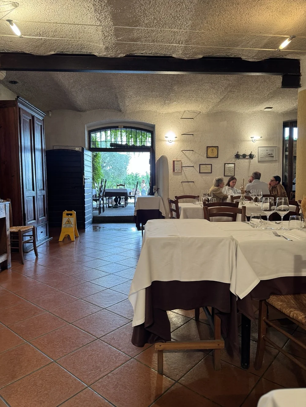 Rustic dining room at Selva Capuzza winery near Lake Garda, Italy