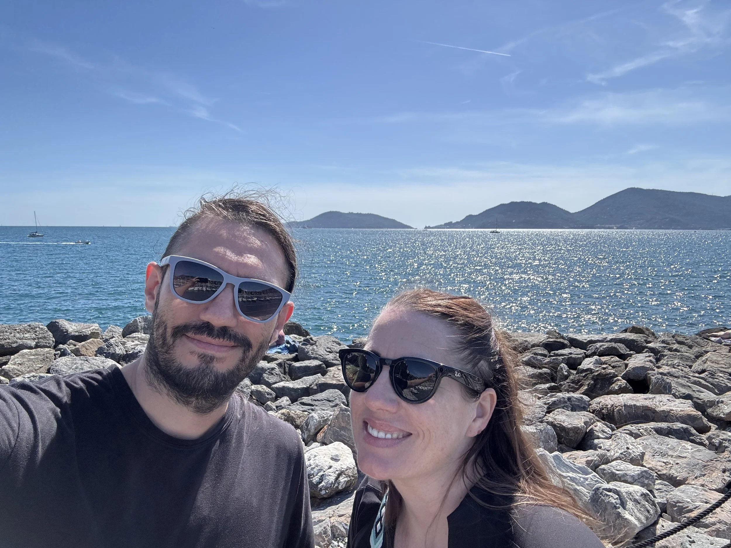 Couple overlooking the rocky Gulf of Poets coast