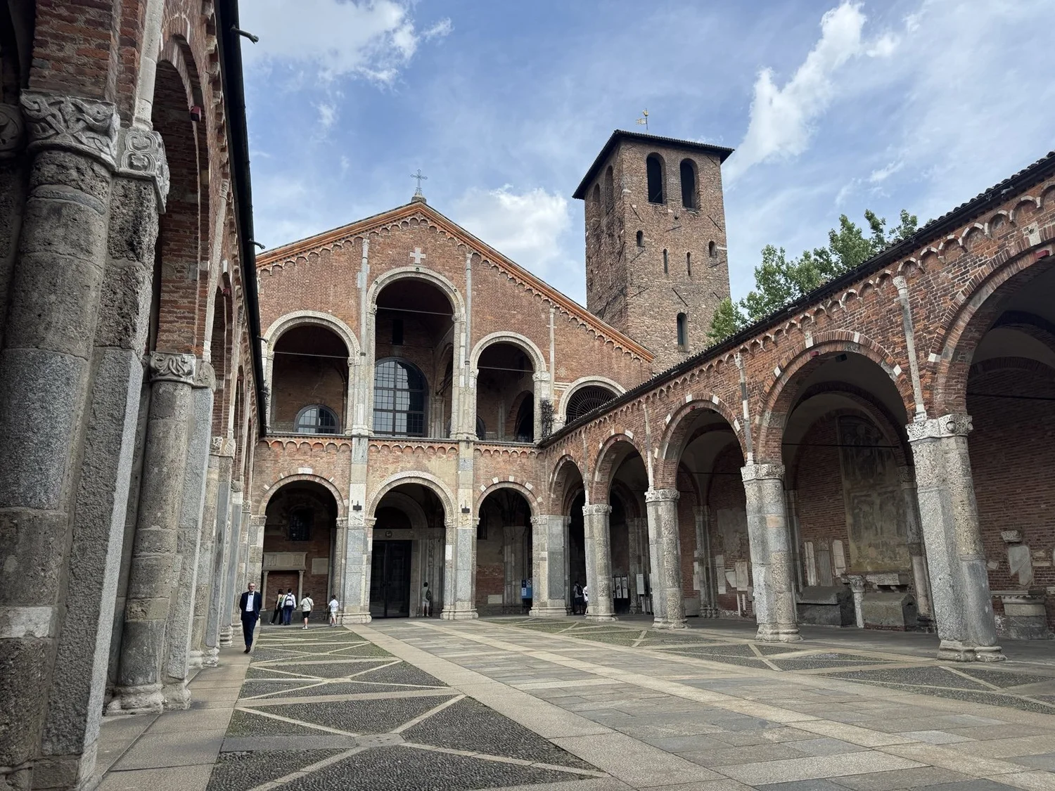 Romanesque courtyard and bell tower at Basilica di Sant’Ambrogio in Milan