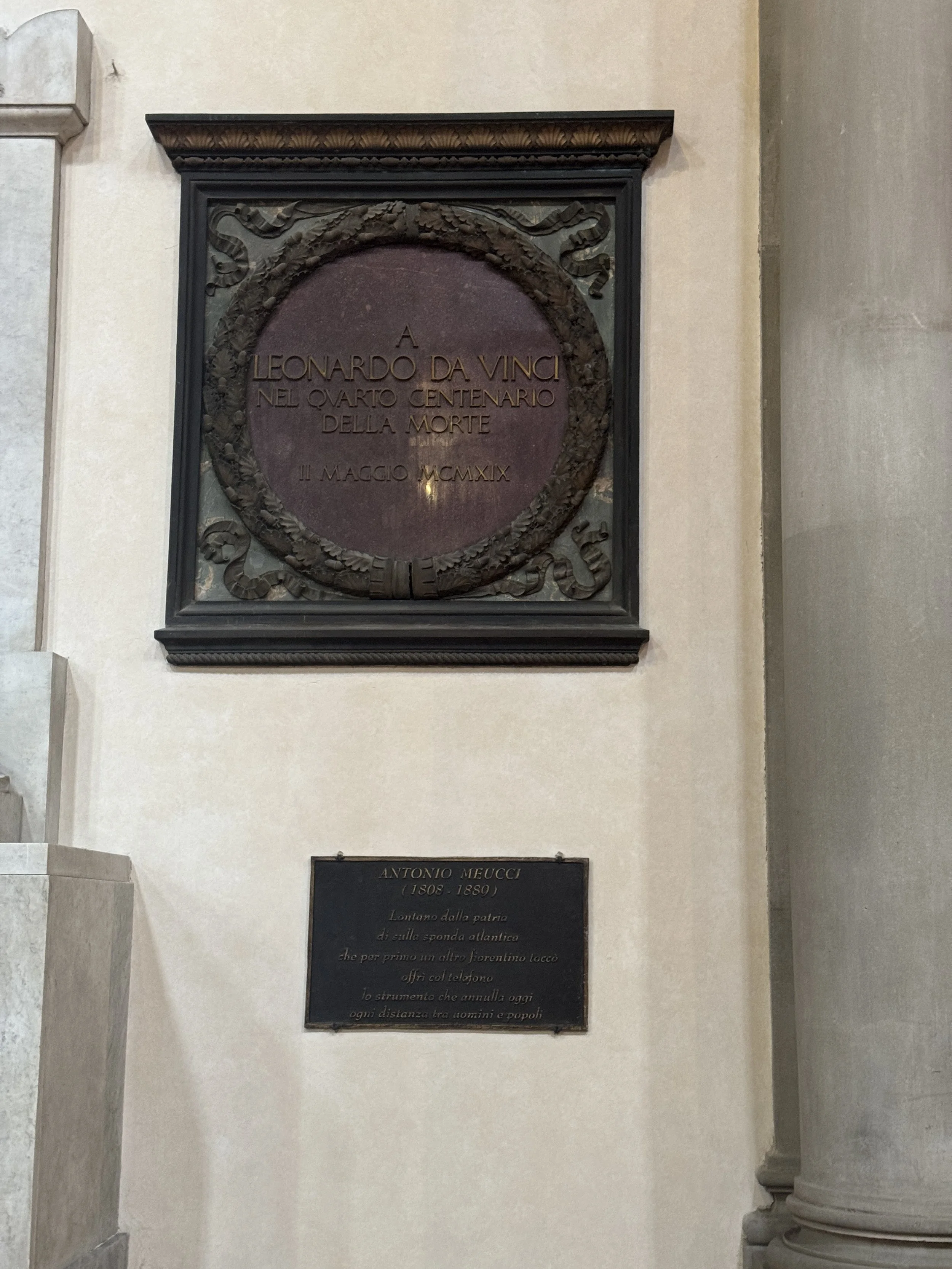 Historic memorial plaque mounted inside the Basilica di Santa Croce.