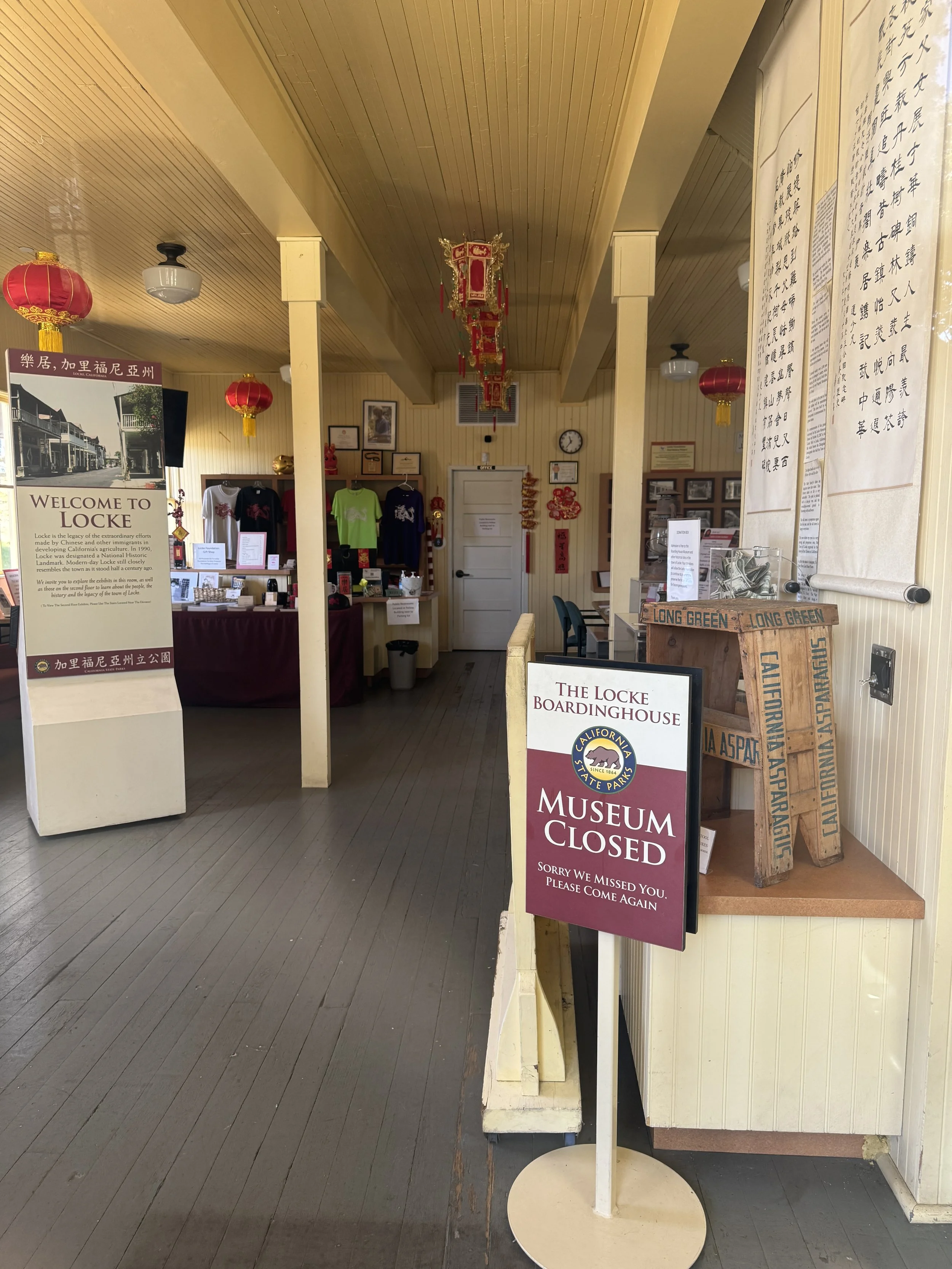 Locke Boarding House museum entrance decorated with red Chinese lanterns and historic displays in Locke, California.