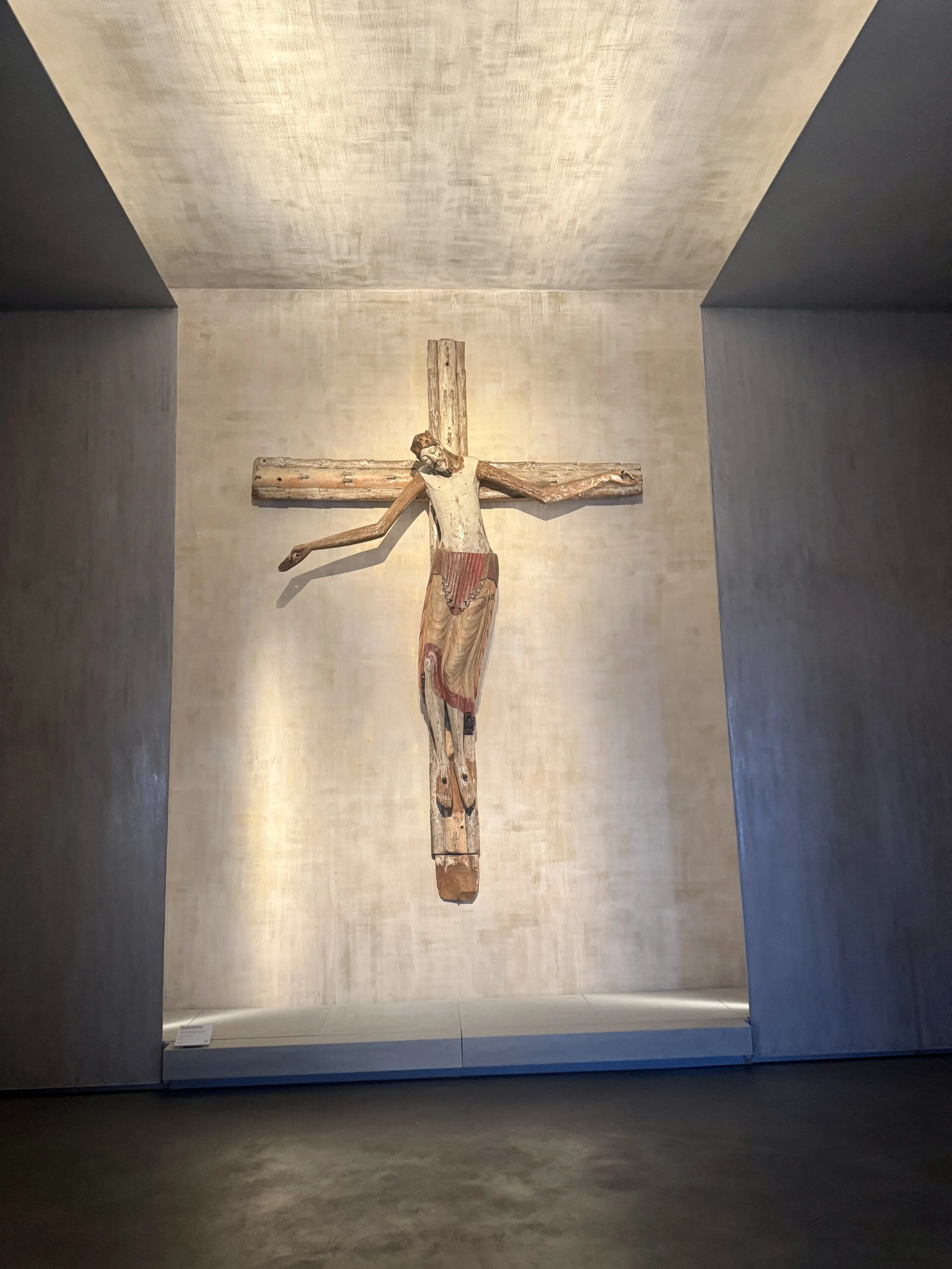 Historic wooden crucifix displayed inside Pisa’s Duomo Museum