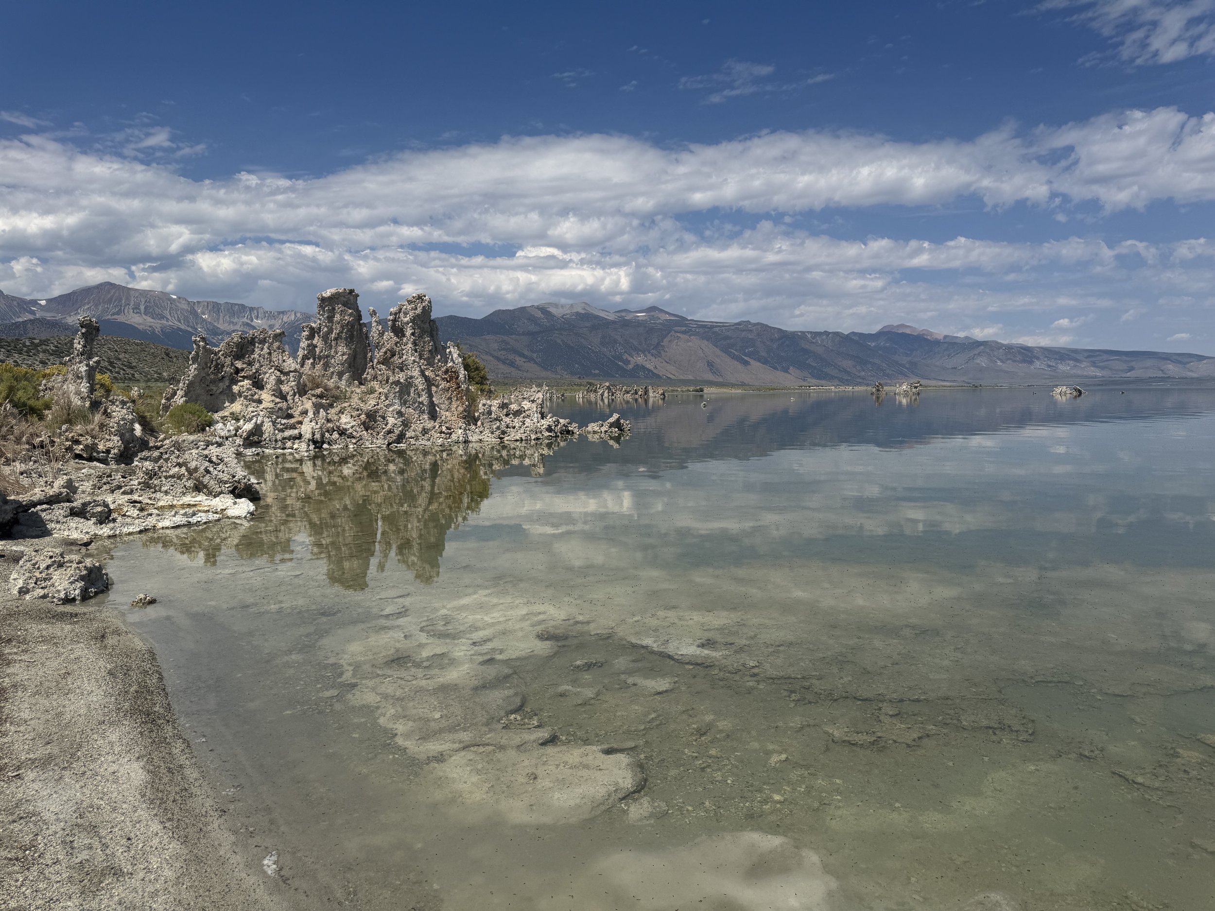 Tufa formations reflected in the clear shallow water along Mono Lake’s South Tufa shoreline.