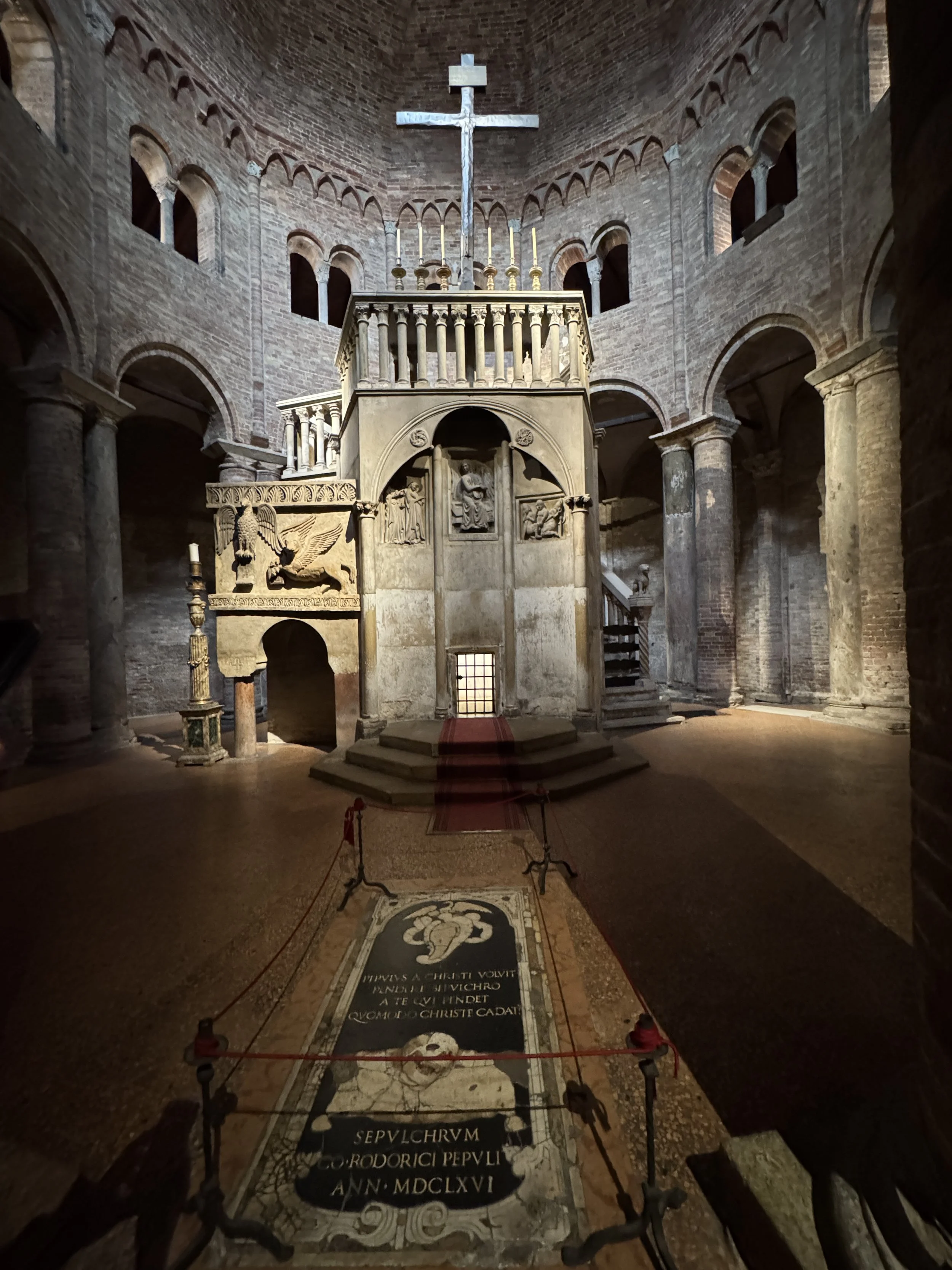 Ancient circular church interior and altar inside Bologna's Seven Churches complex.