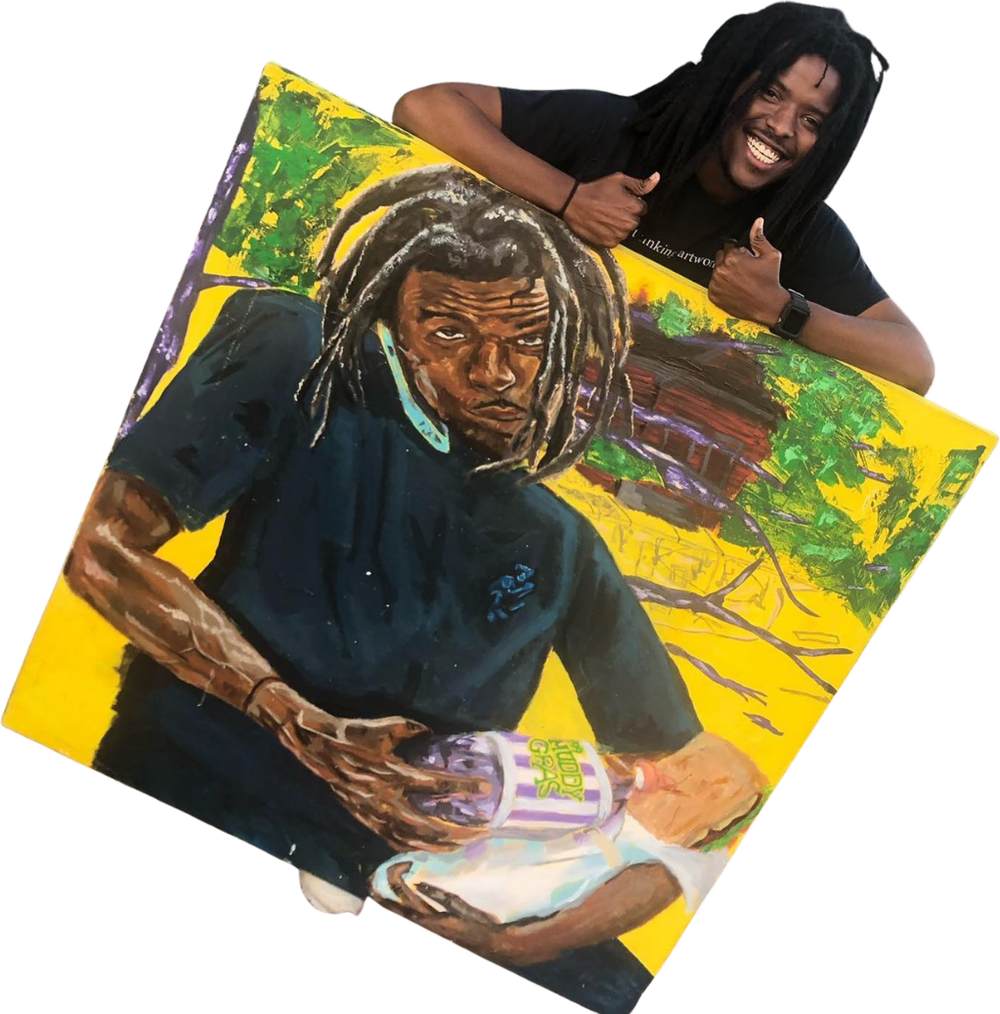 Haze Haywood leaning over one of his paintings