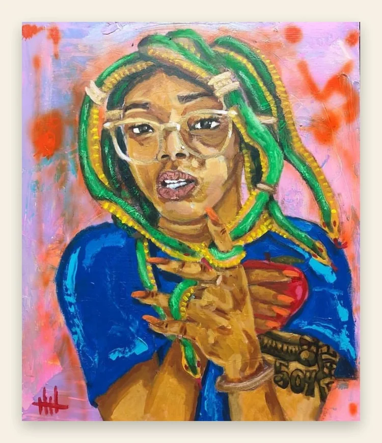 Portrait of a woman with green braids