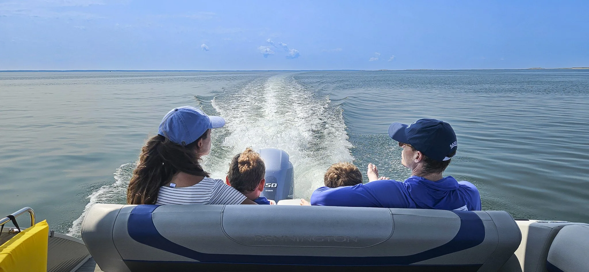 Family enjoying a private boat tour on Wellfleet Harbor