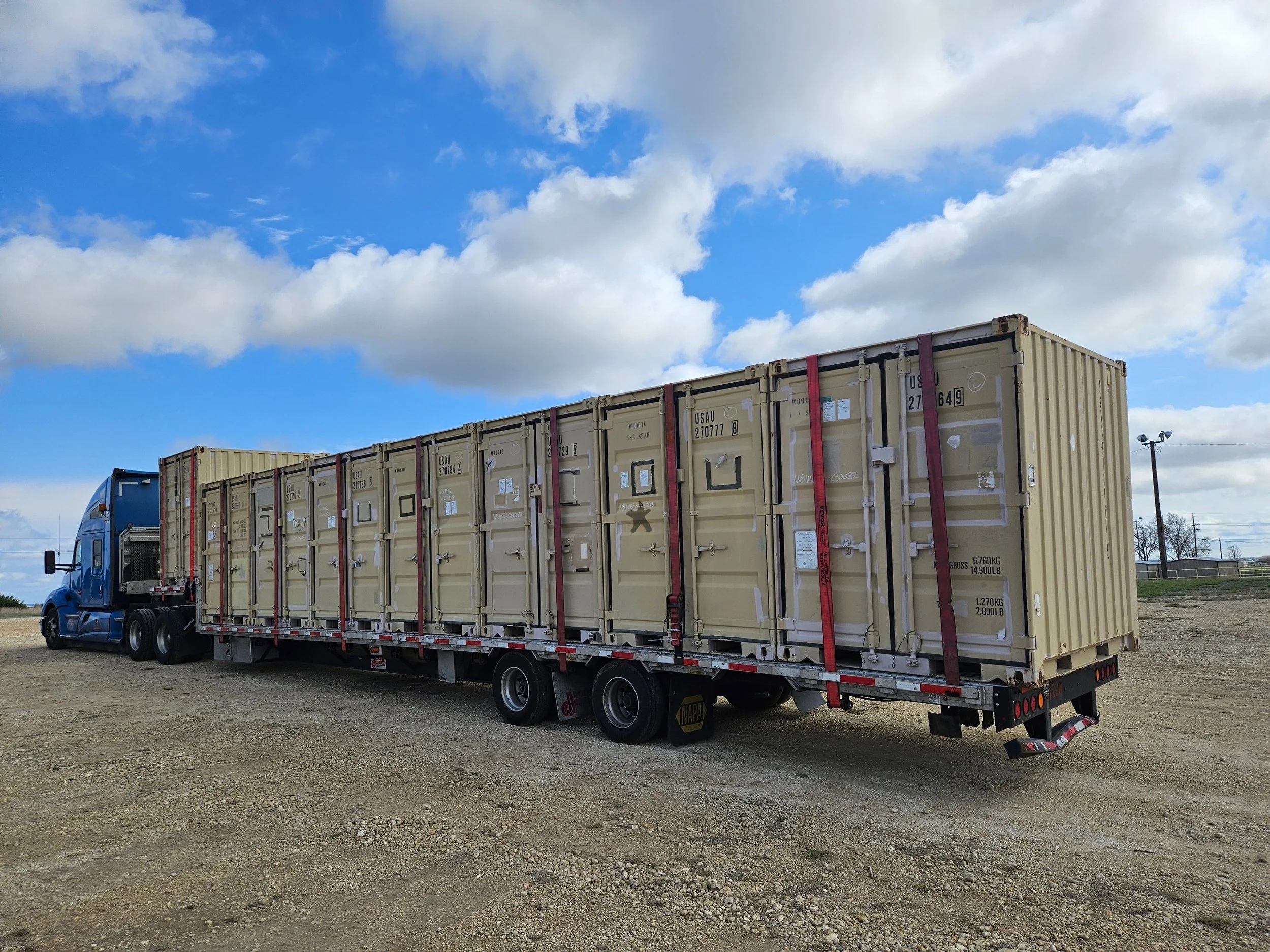 BAR Transportation blue Kenworth at military installation