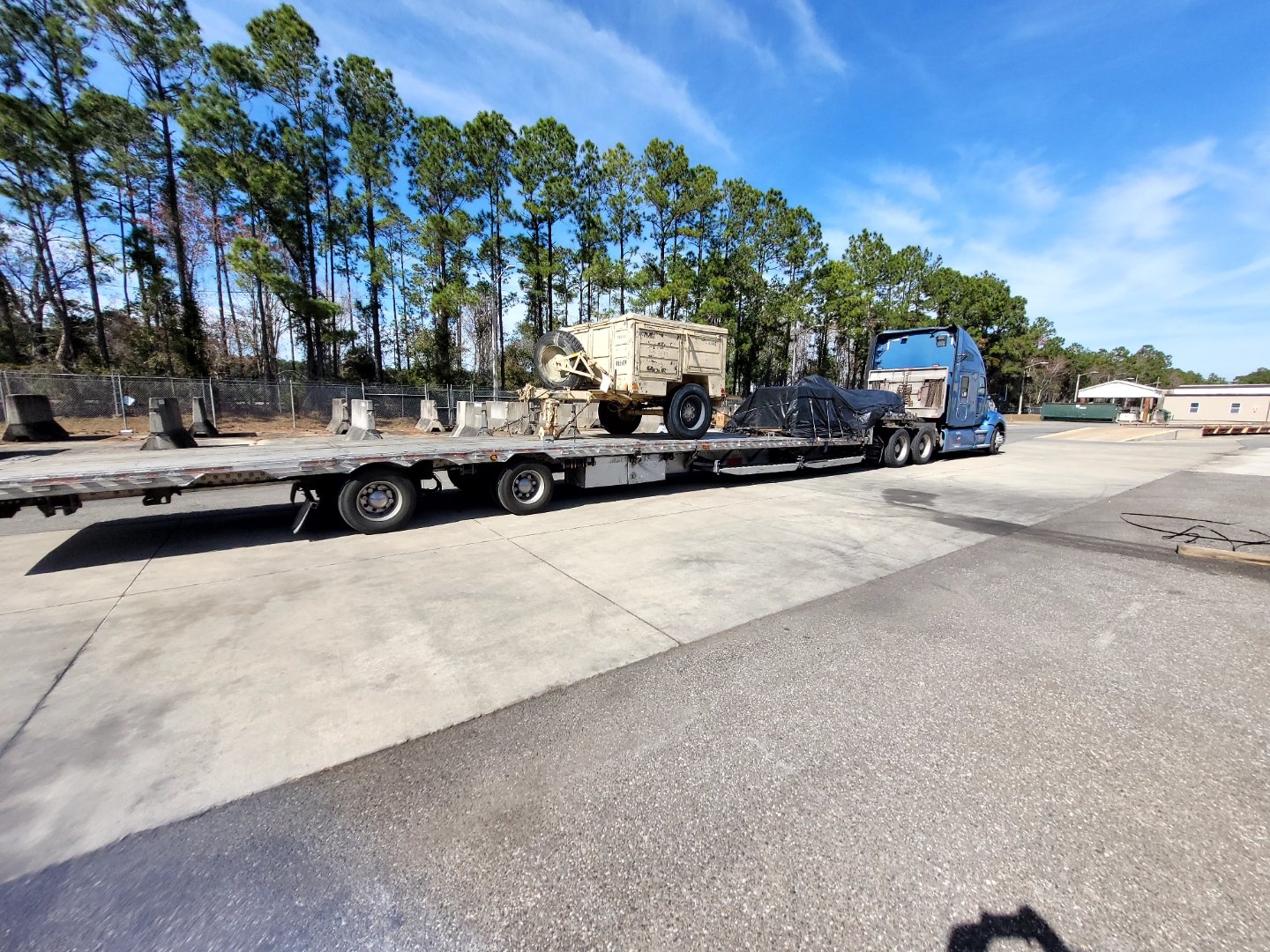BAR Transportation at military base gate with credentialed driver