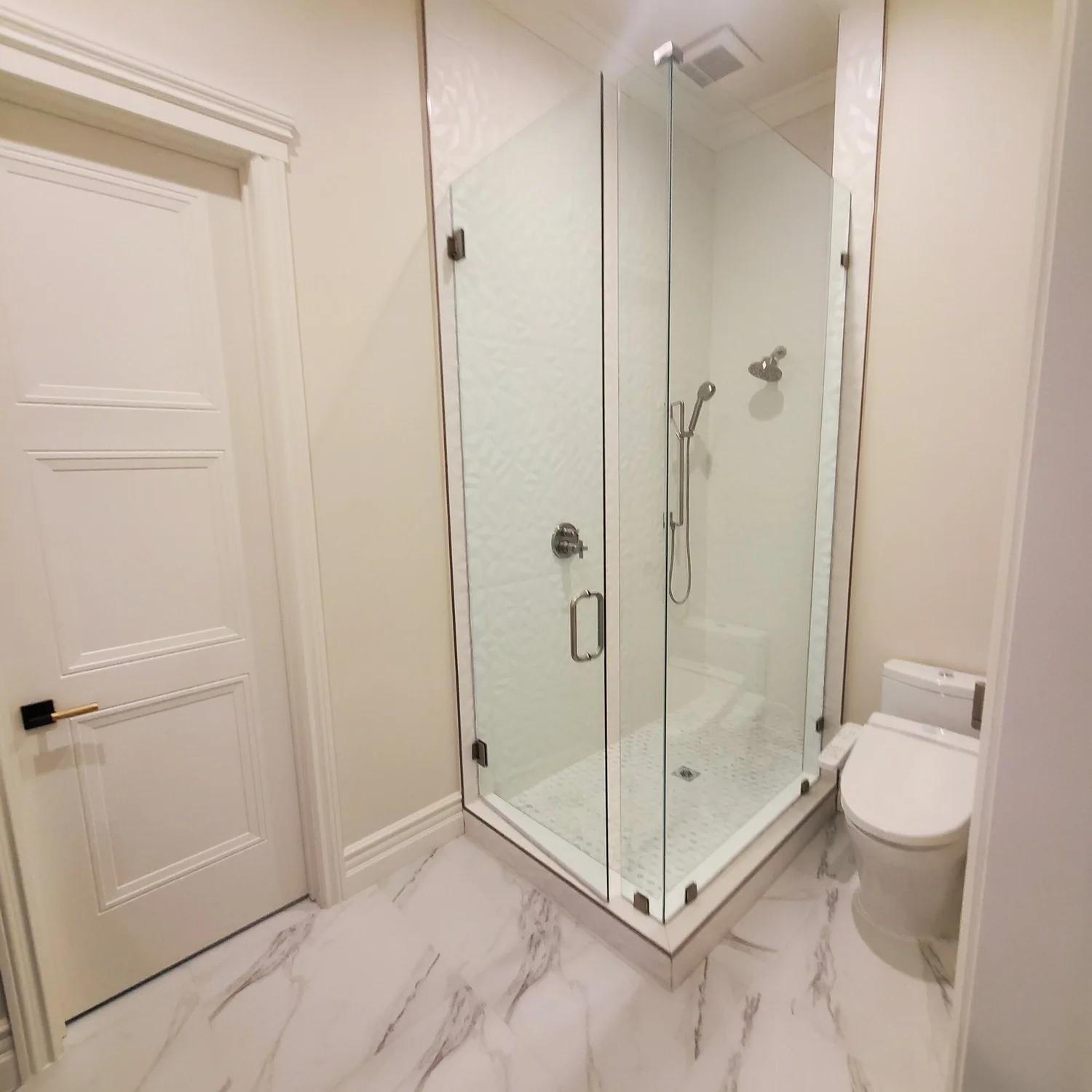 Guest bath with frameless glass corner shower — custom home, Fresno, CA