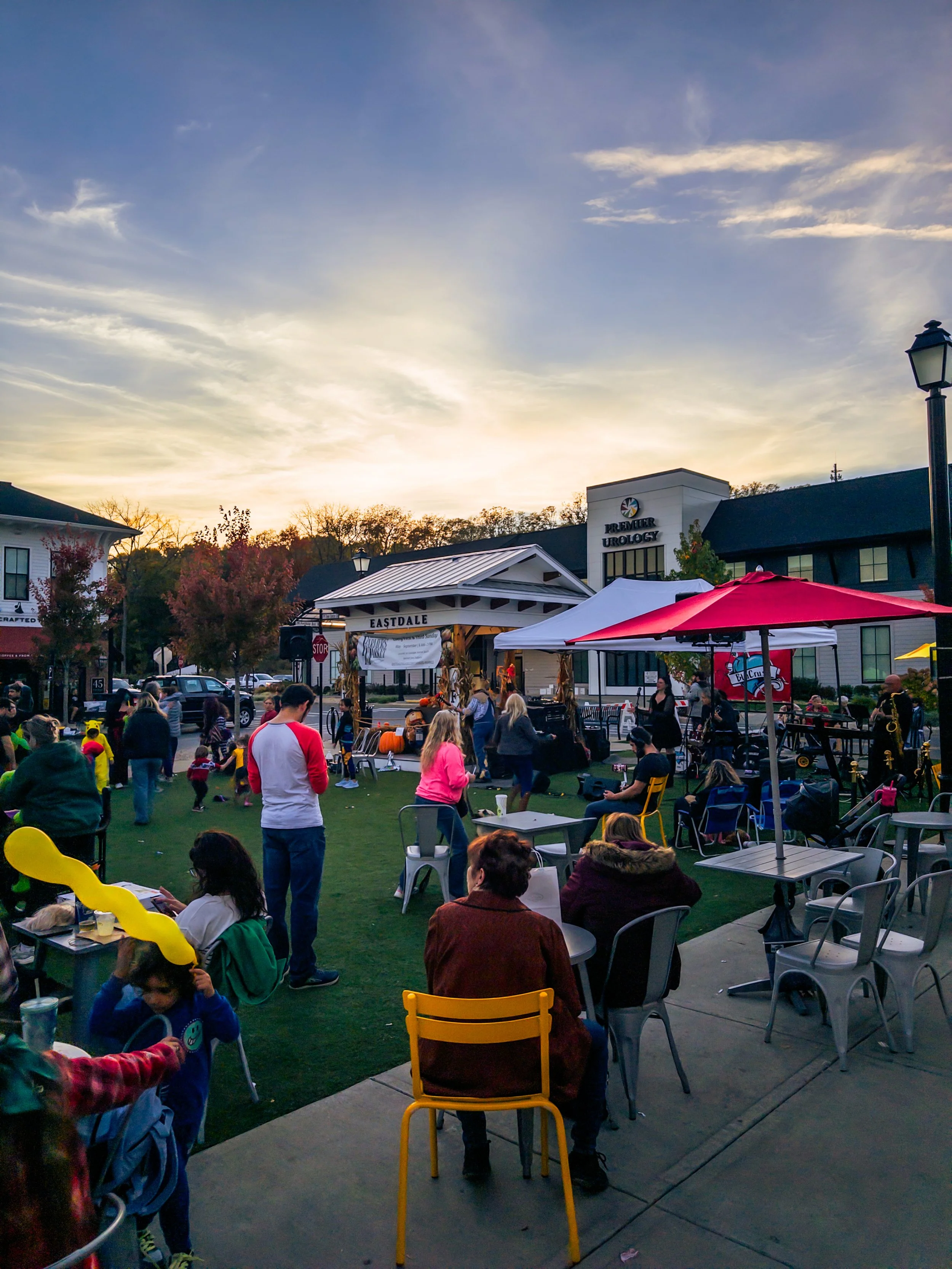 Visitors gather on the Eastdale Village green at dusk during last year’s Harvest and Haunt.