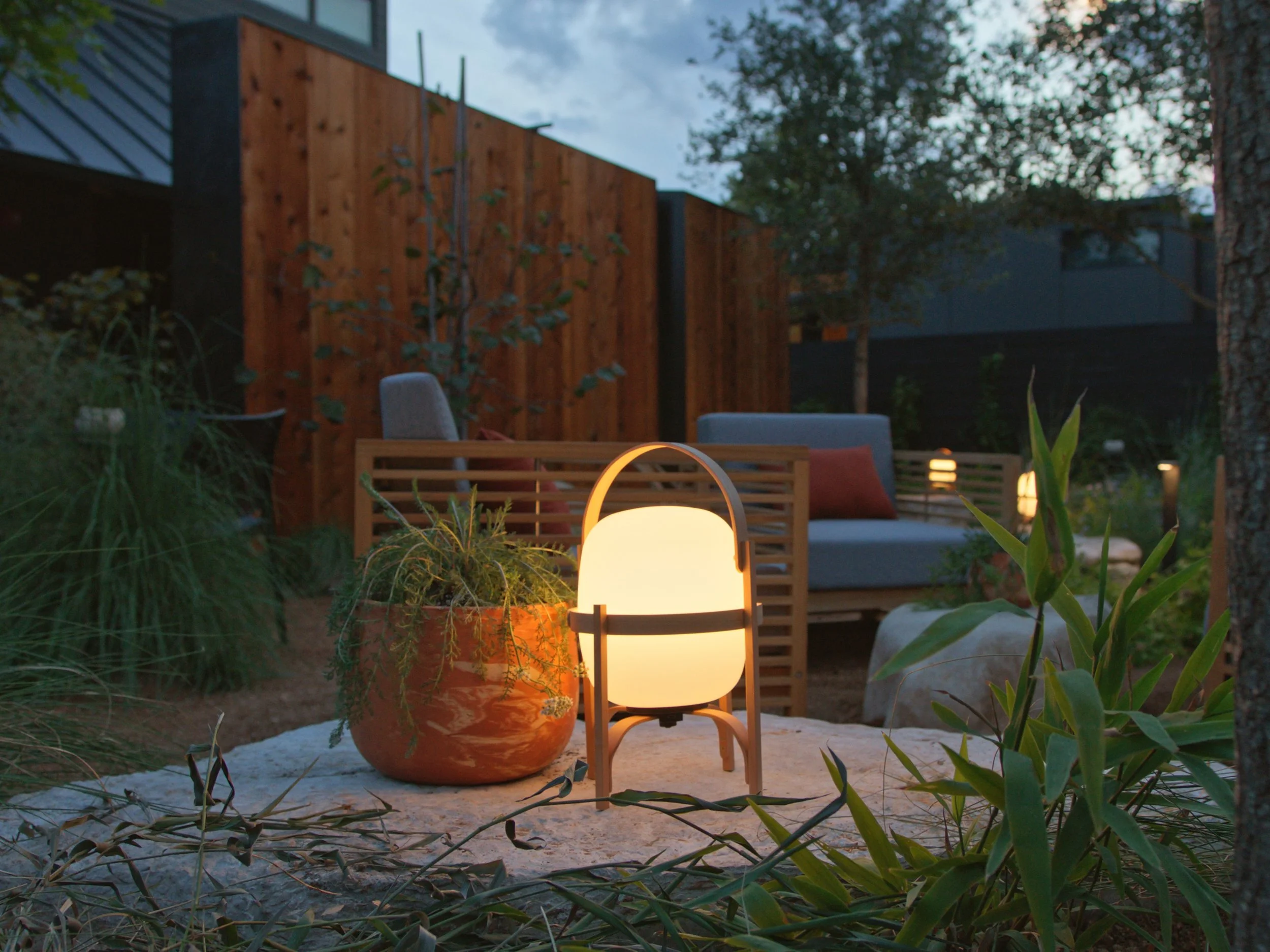 Frame Hotel SoCo lantern at dusk on the patio