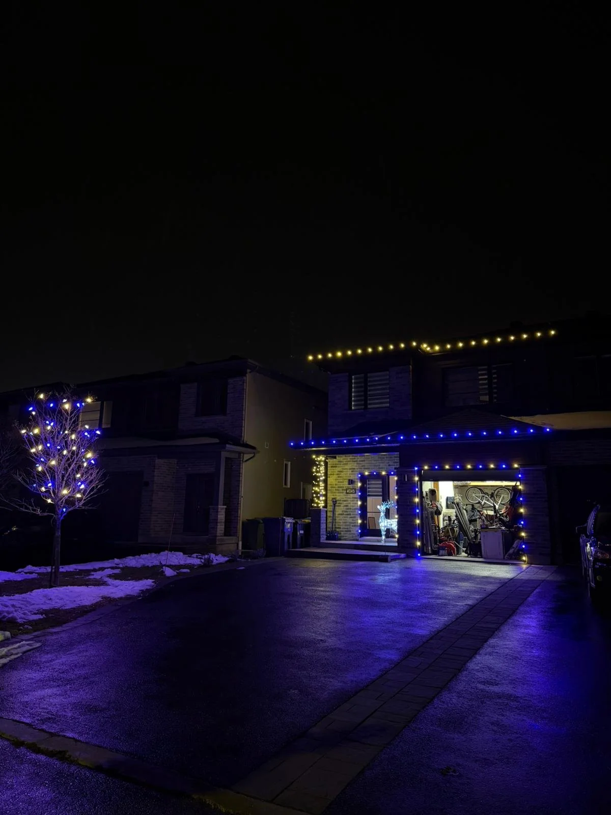 Mercier — maison décorée de lumières