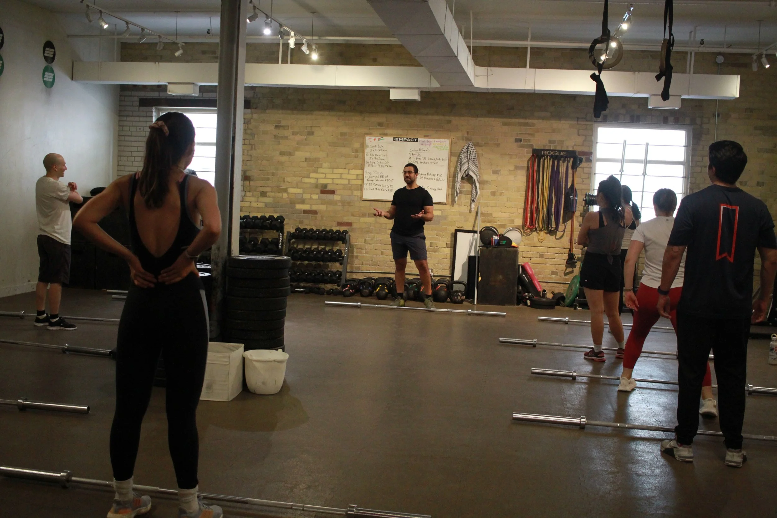 Empact Fitness Coach leading a class