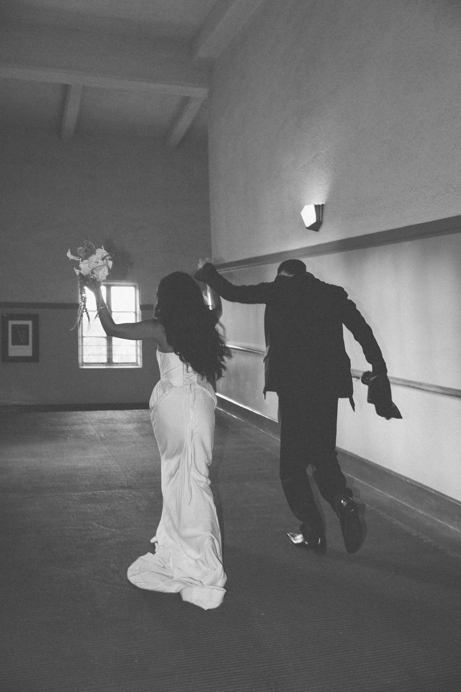 Newlyweds dancing at their reception