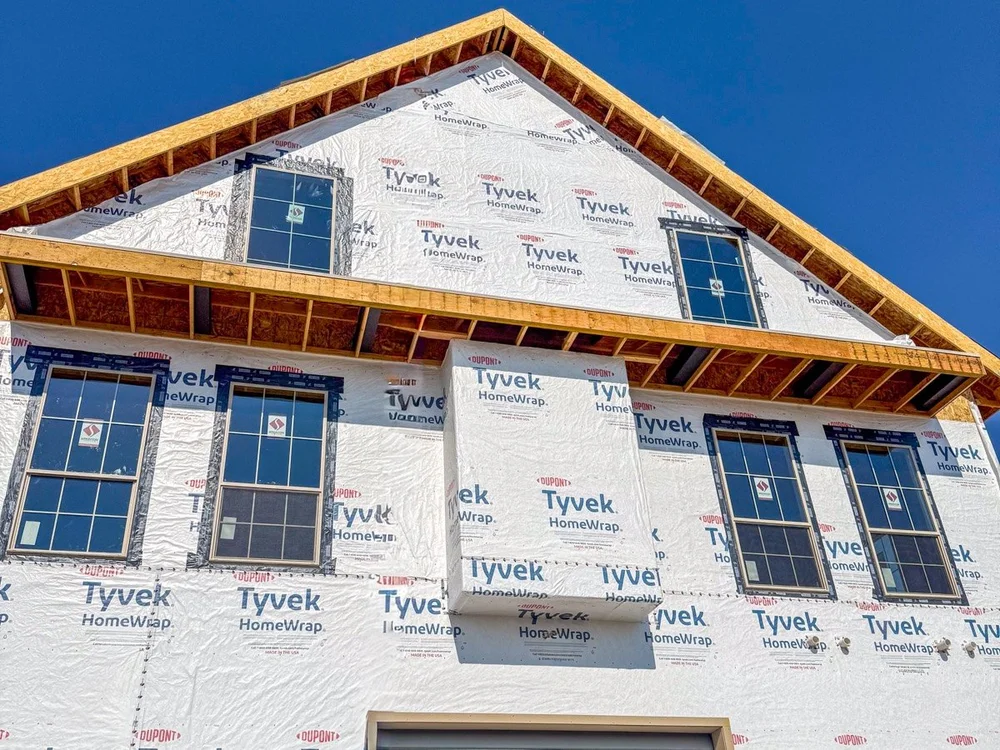 House wrap and window flashing installed before siding by Corbridge Construction