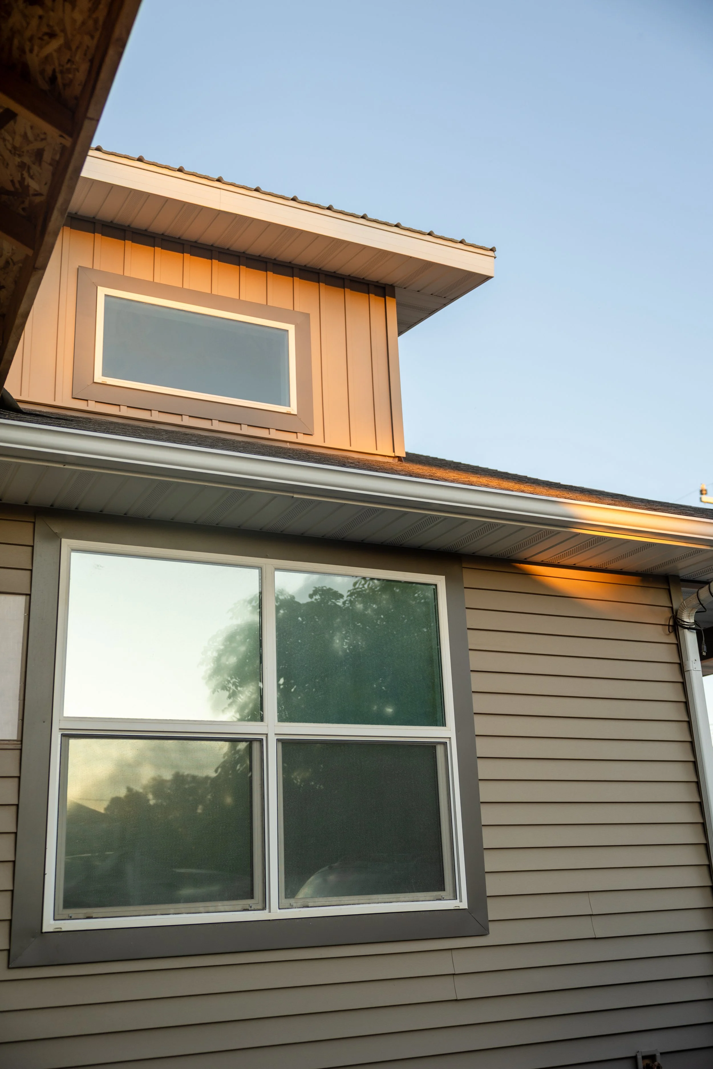 Siding installation on custom home