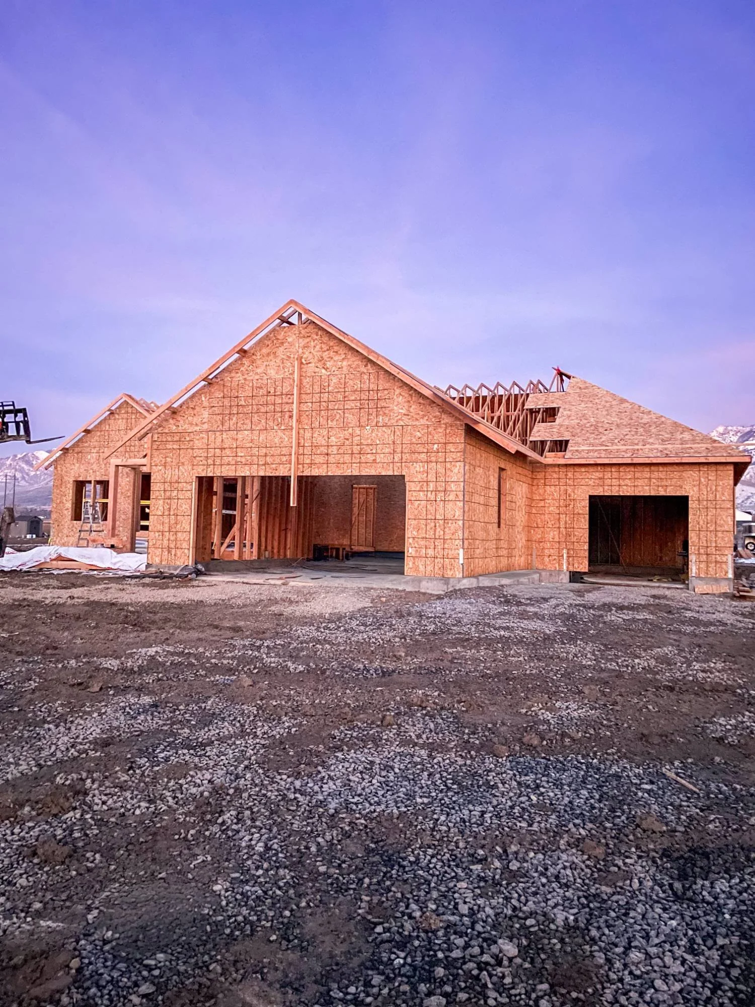 Framing stage of a Smithfield custom home