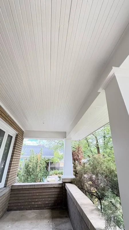Freshly painted porch columns, Logan