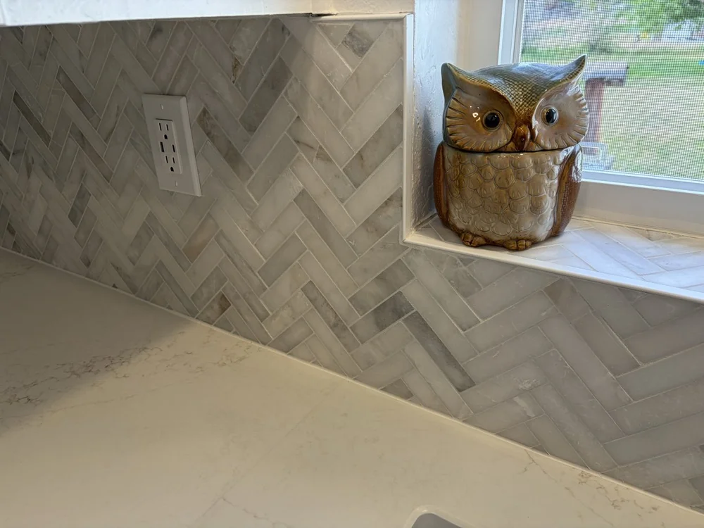 Herringbone marble backsplash tile in a Cache Valley kitchen