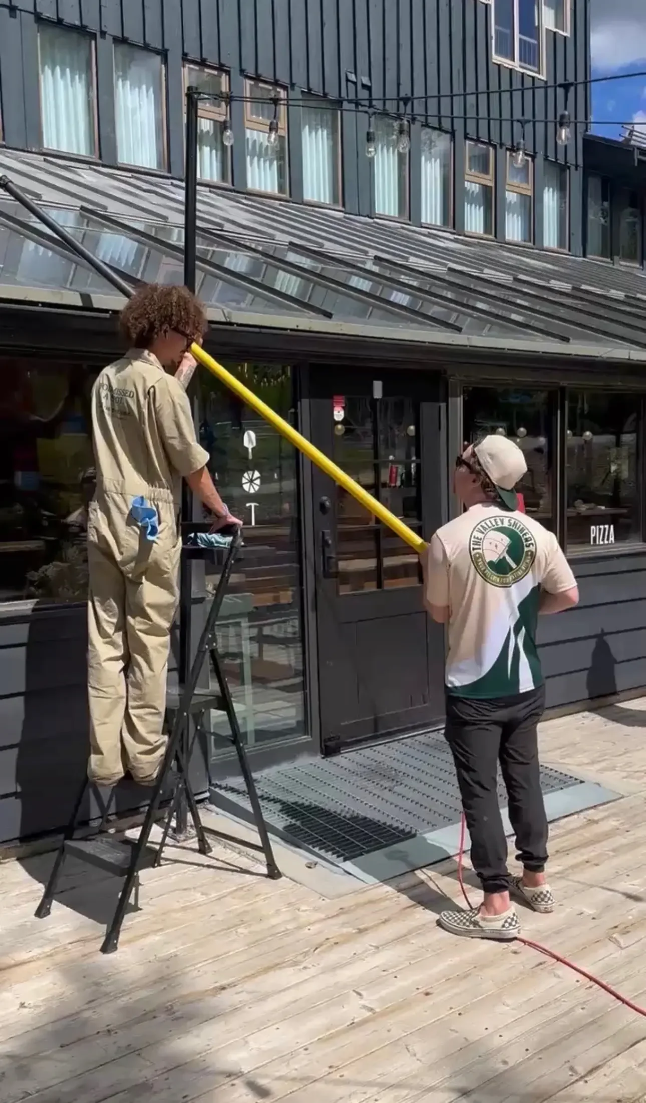 Valley Shiners crew cleaning hotel windows at Panorama Mountain Resort with water-fed pole equipment