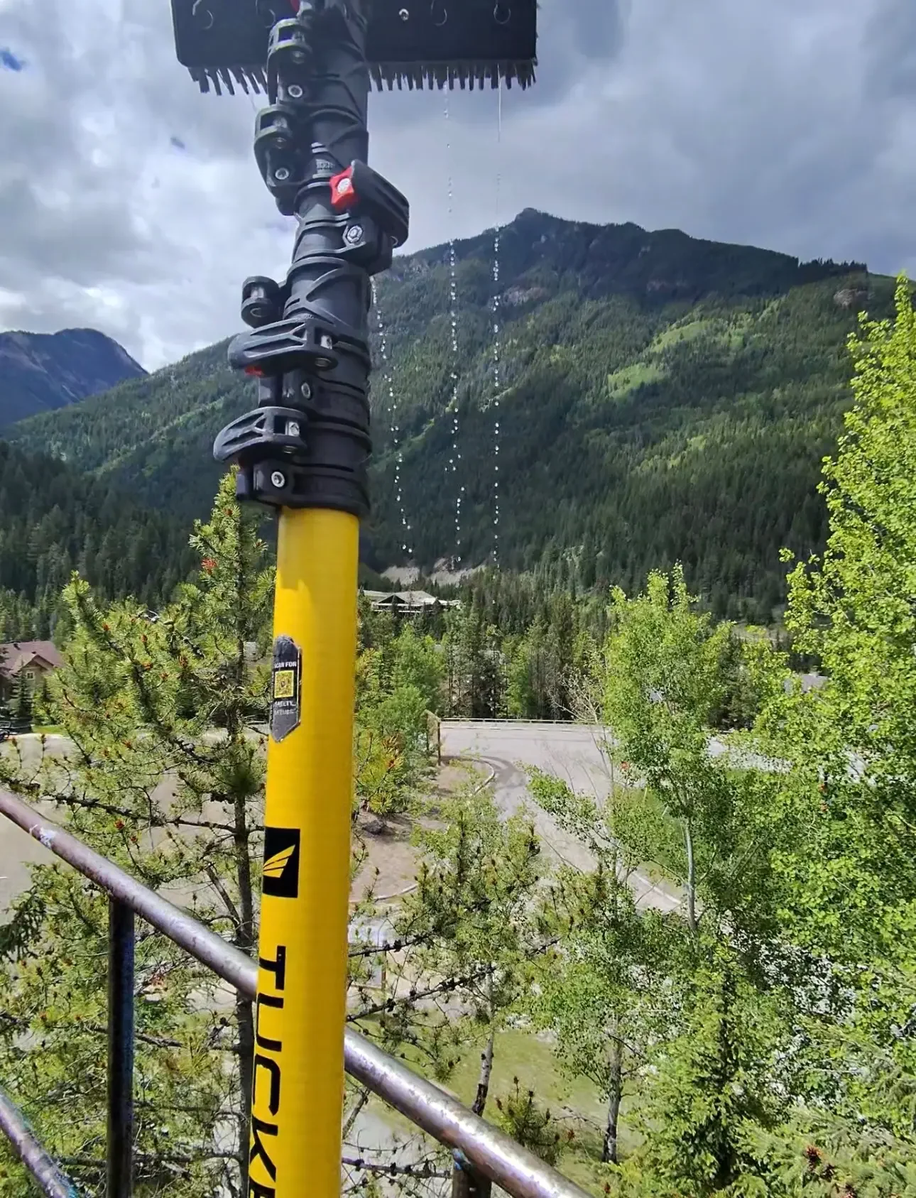 Water-fed pole commercial window cleaning at Panorama Mountain Resort hospitality building