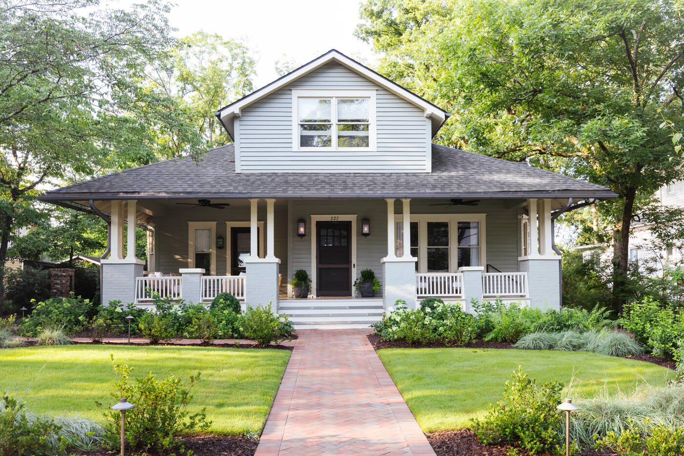 Craftsman residence framed by a mature shade garden in Five Points, Athens, Georgia