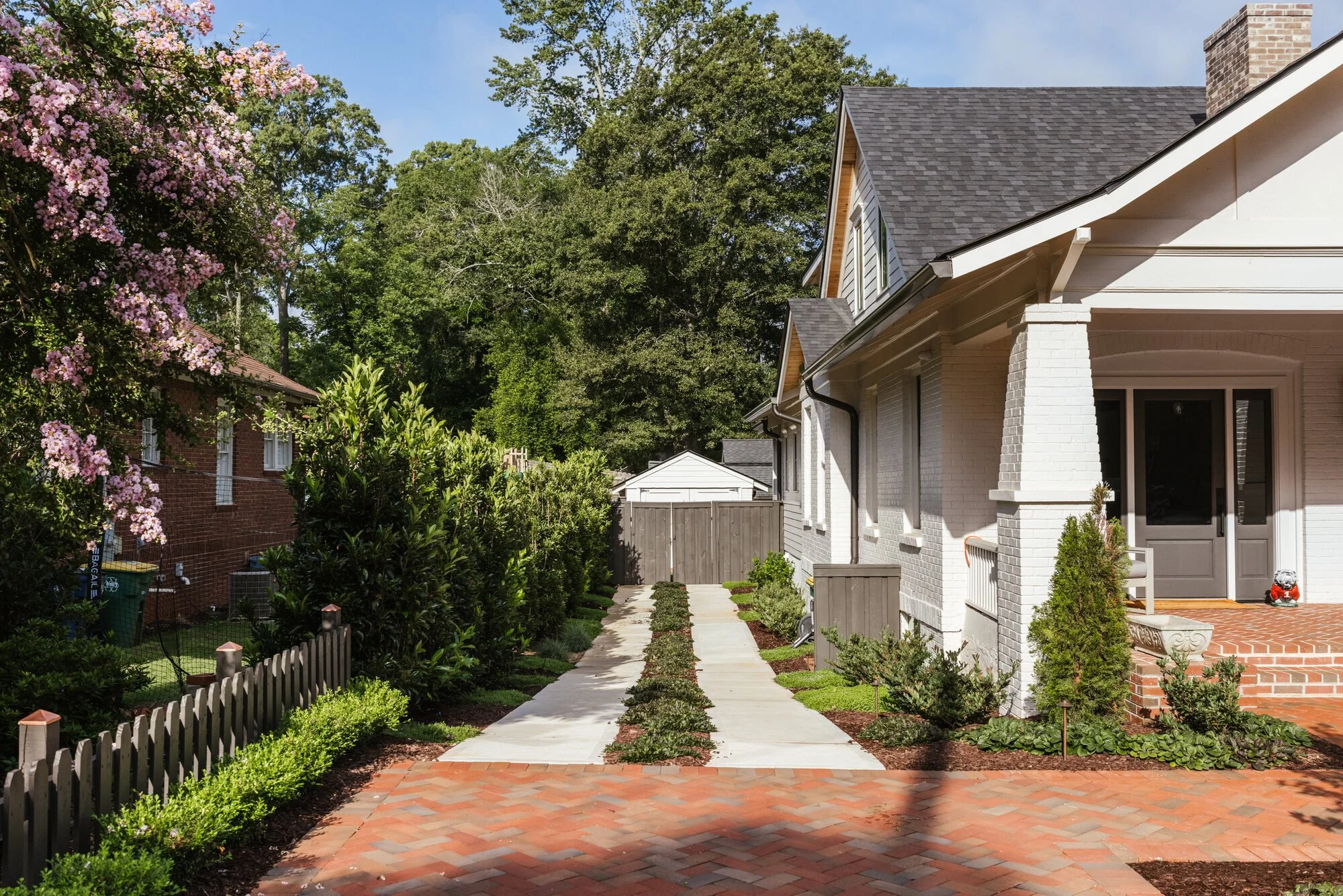 Planted concrete tread strips beside the Cherokee residence