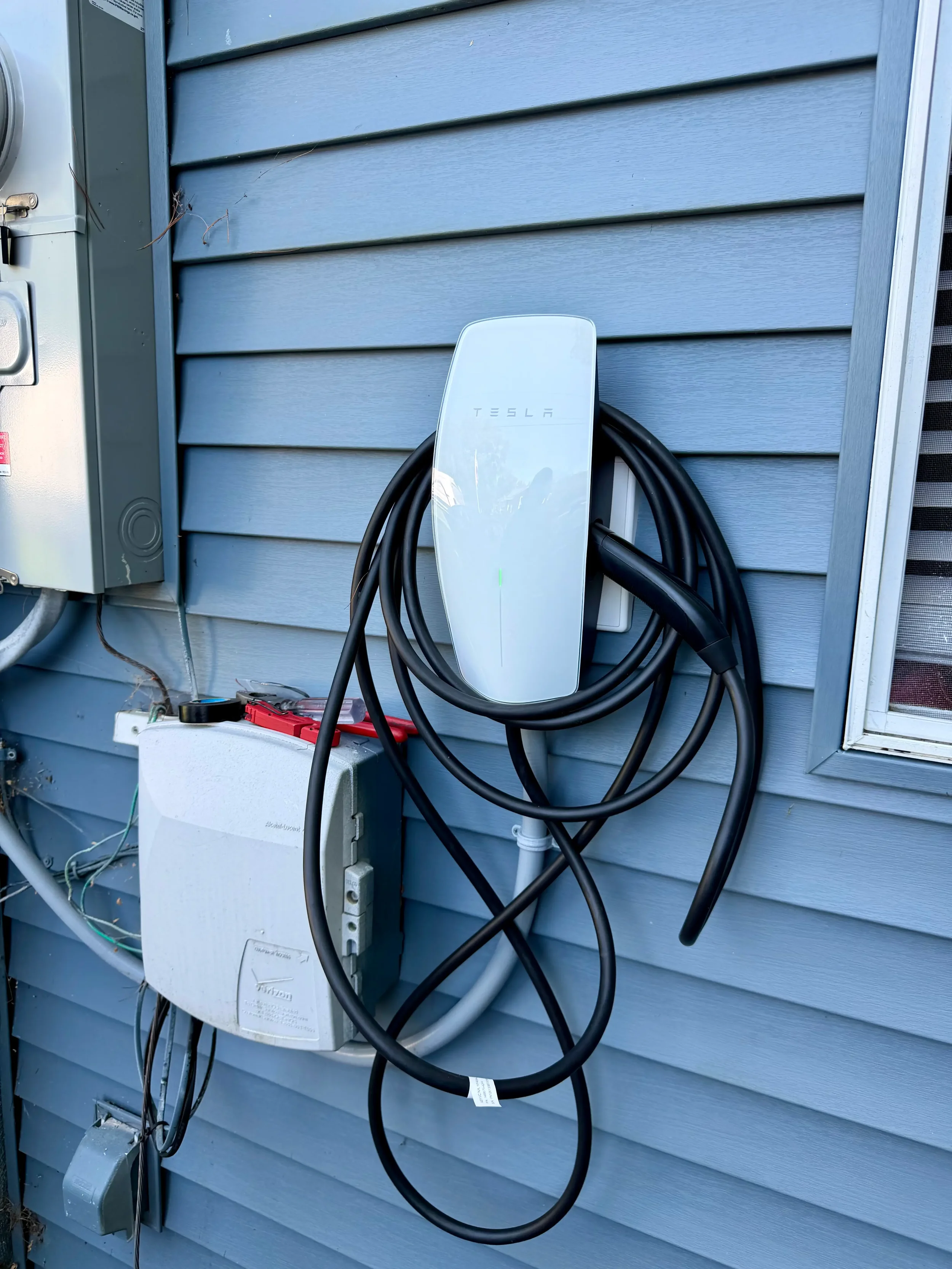 Tesla Wall Connector EV charger installation in Hope Rhode Island by Melone Electric