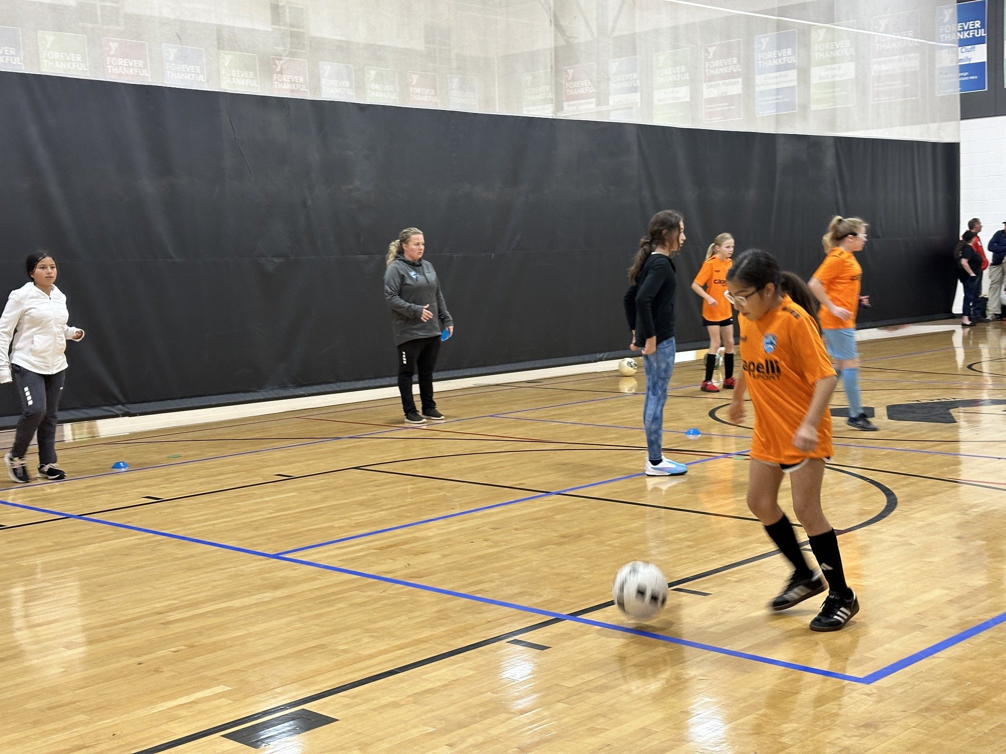 Player working on close ball control during indoor training