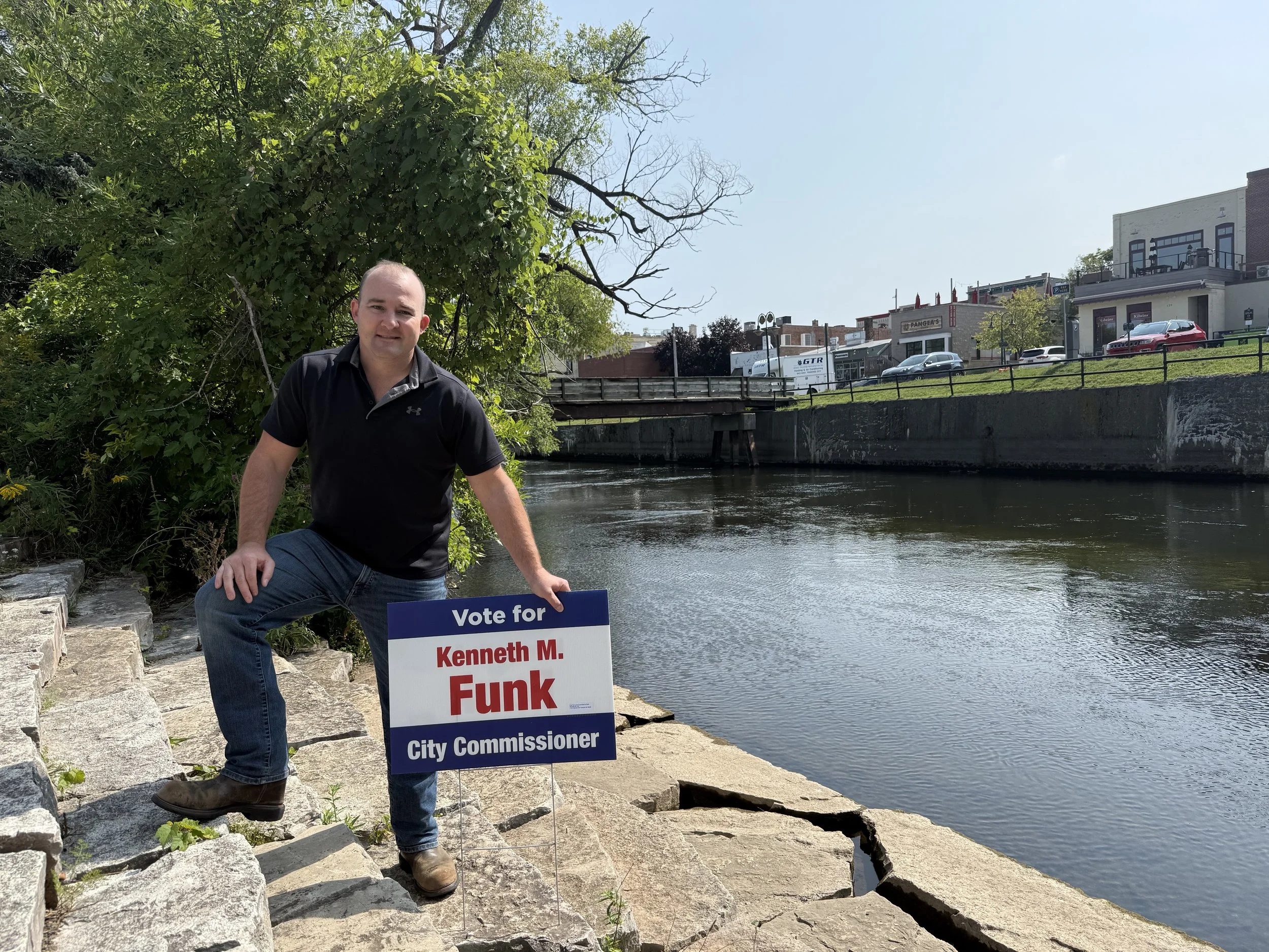 Kenneth M. Funk campaigning by the Lower Boardman River in Traverse City
