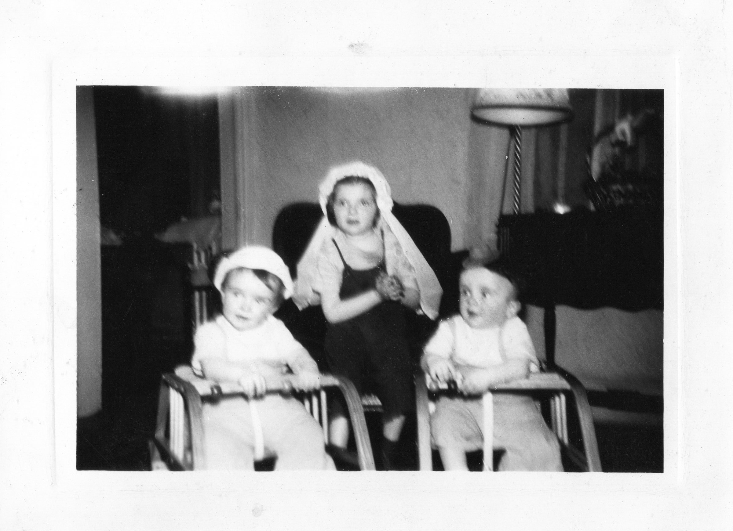 Helen with veil and twins in walkers