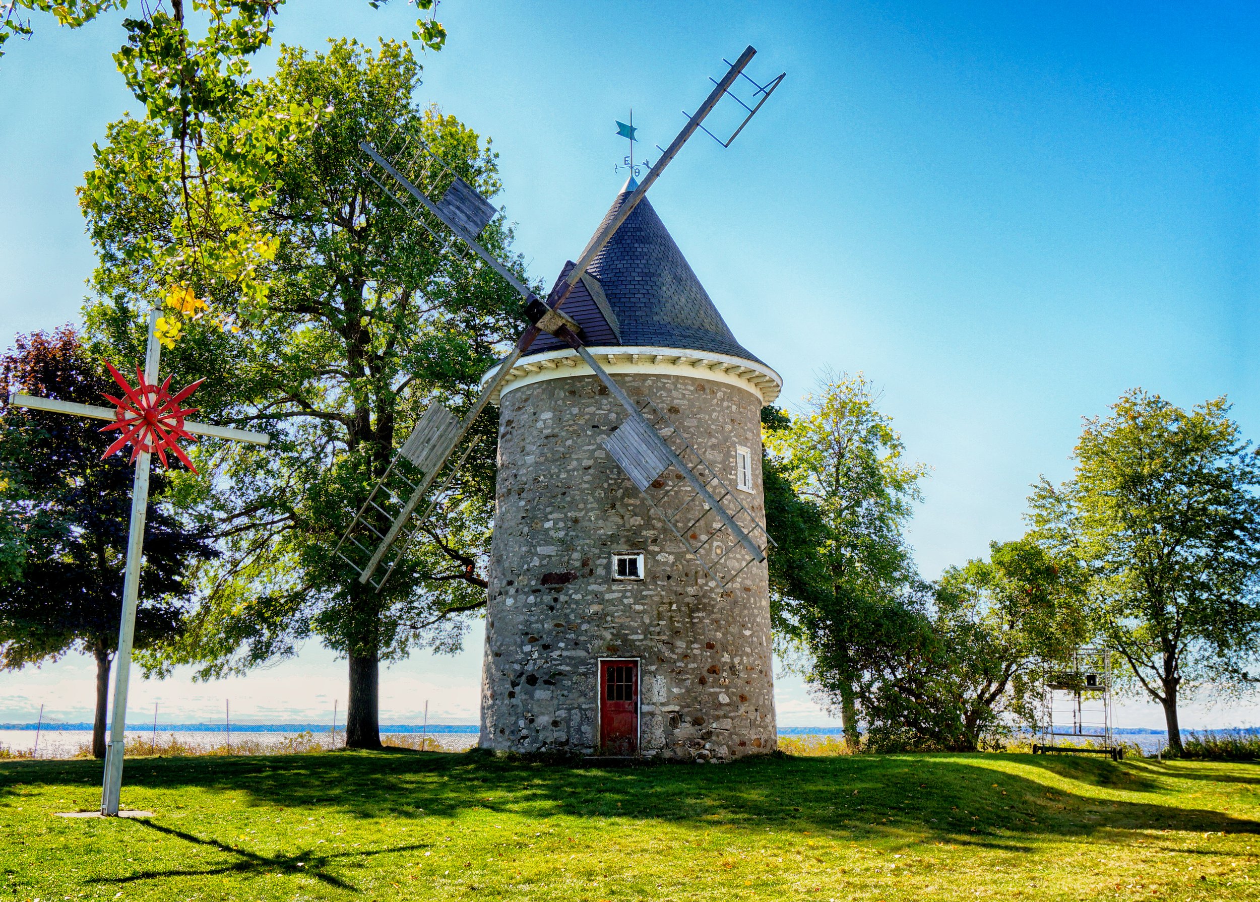 The stone windmill at Pointe-Claire, Quebec, built about 1708 and restored in 1967, standing on the shore of Lac Saint-Louis