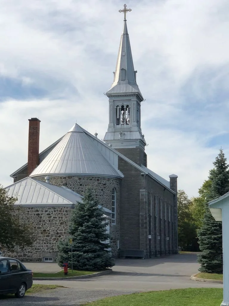 Saint-Constant church rear and side elevation showing circular apse and modern addition