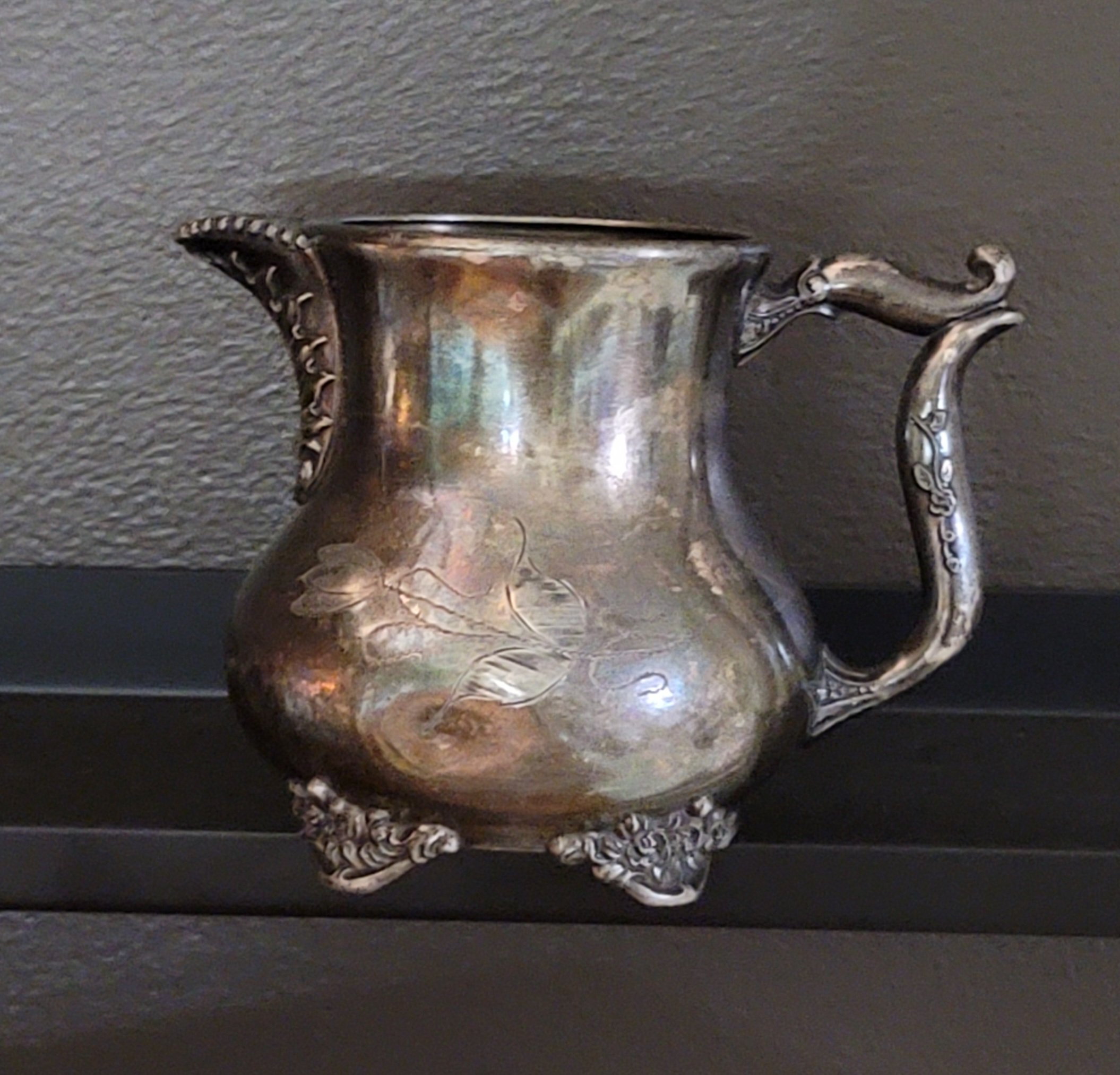 Poole Silver creamer with floral etching