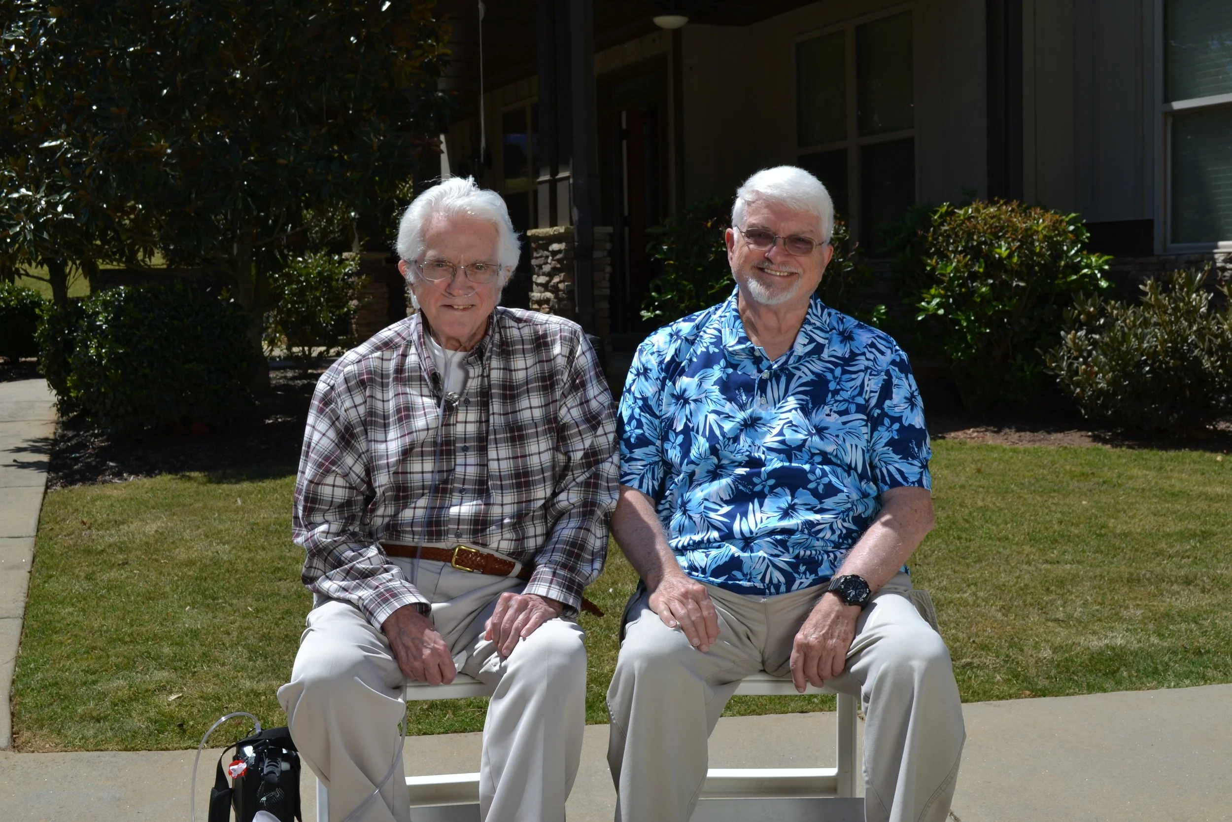 The official portrait of the O'Brien twins on their 80th birthday