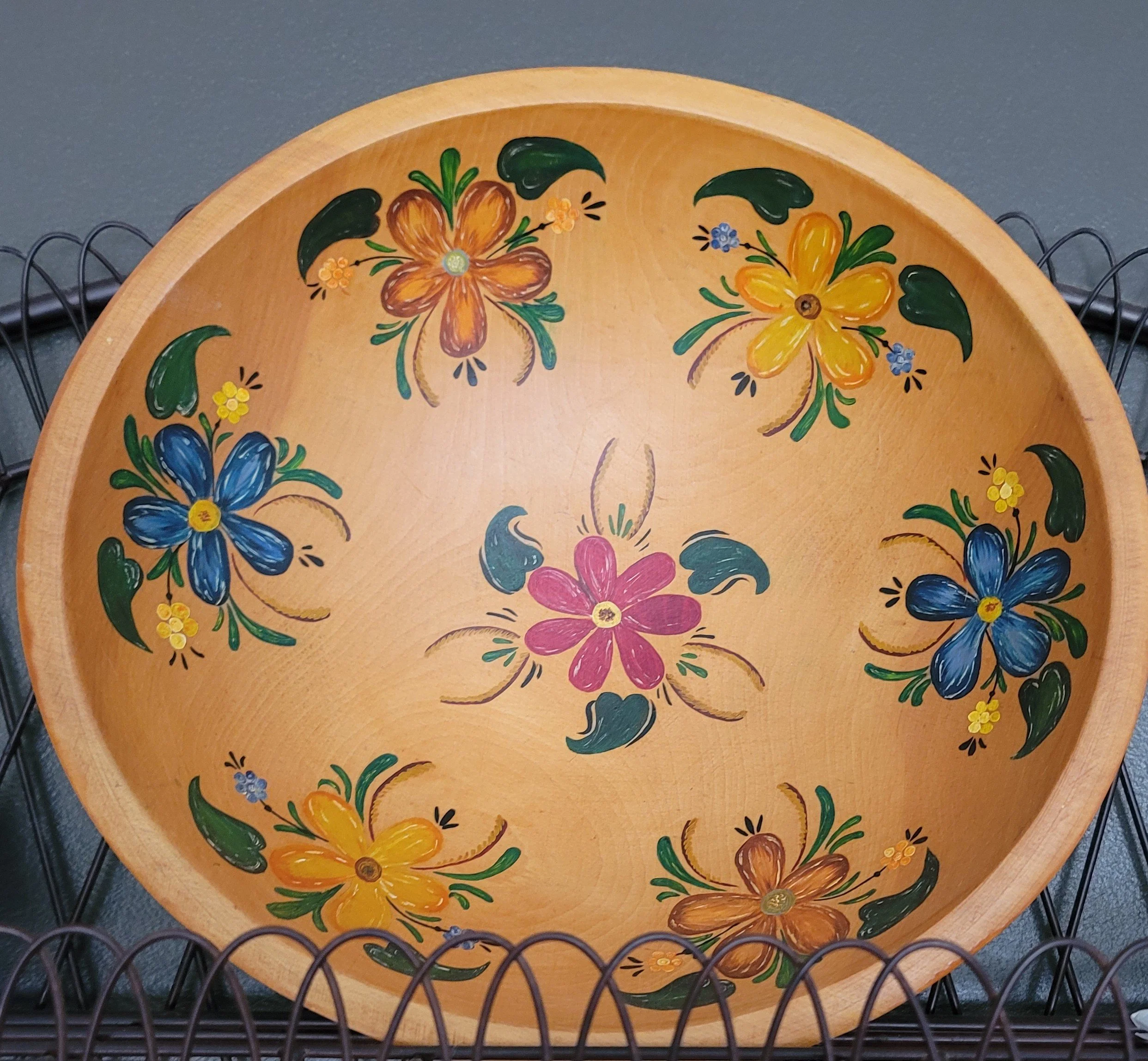 Close-up of large Munising maple bowl with hand-painted floral design