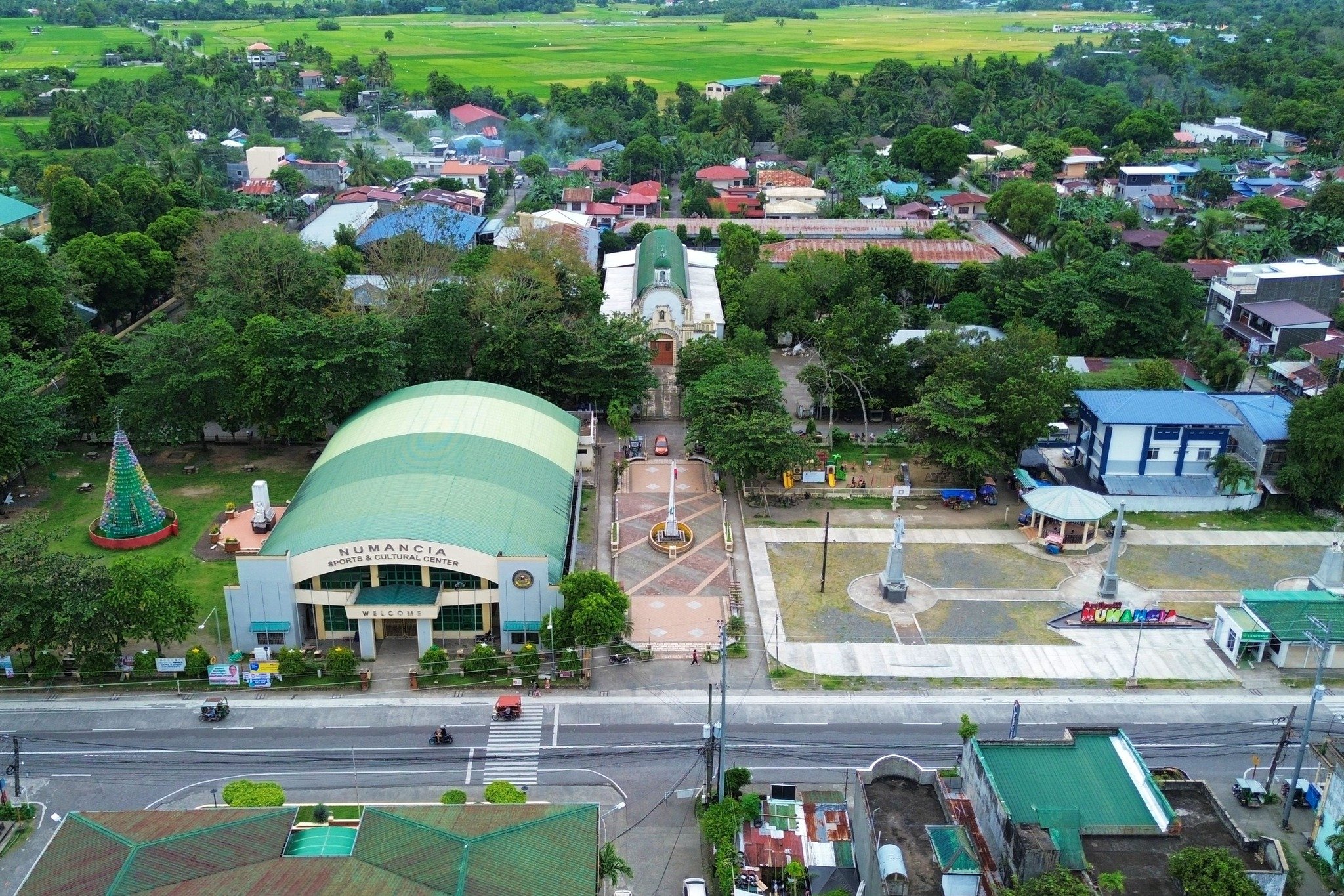 Aerial view of Numancia's plaza, civic center, and the parish church on a single axis