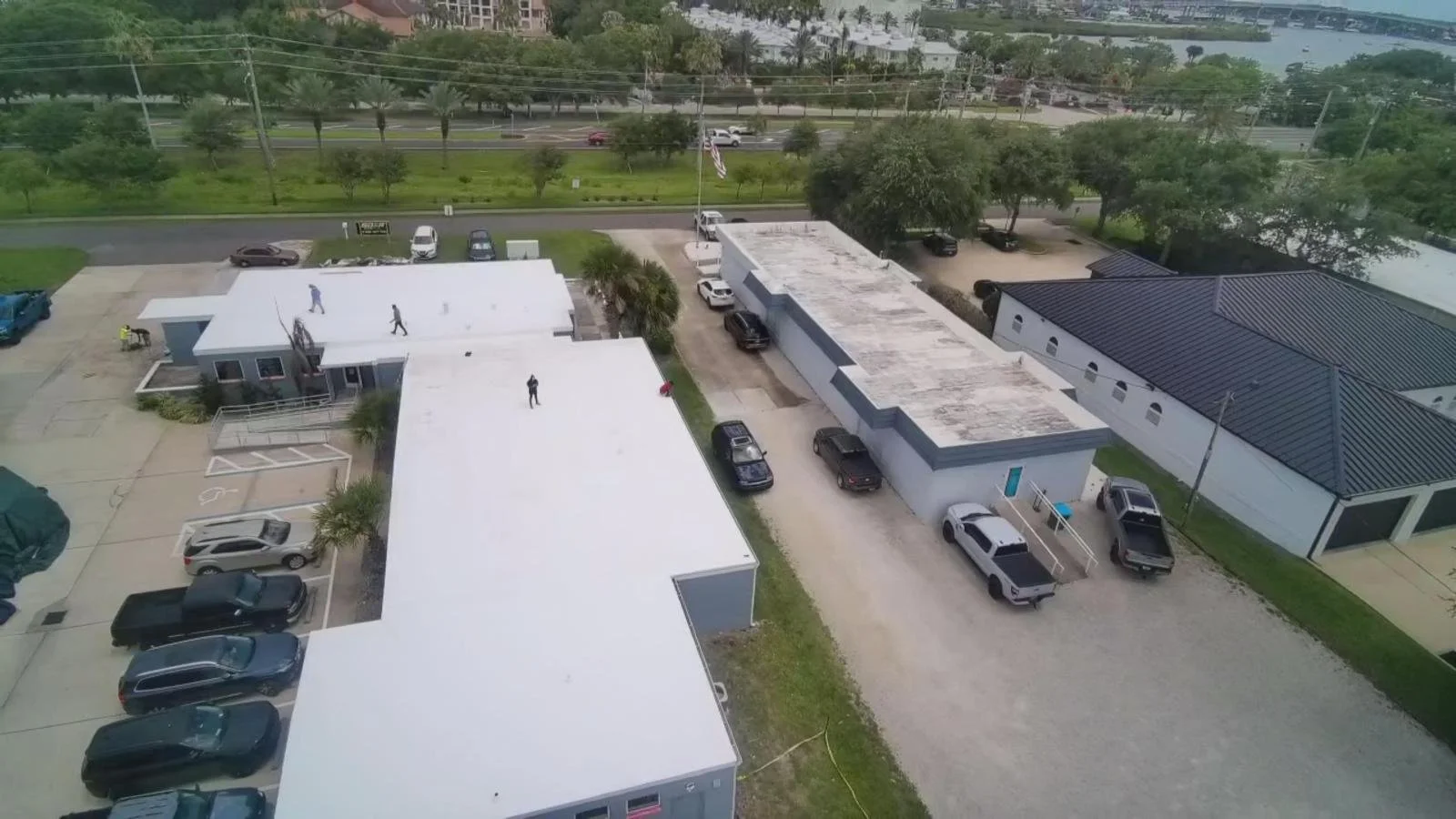 Commercial TPO roofing system installation.