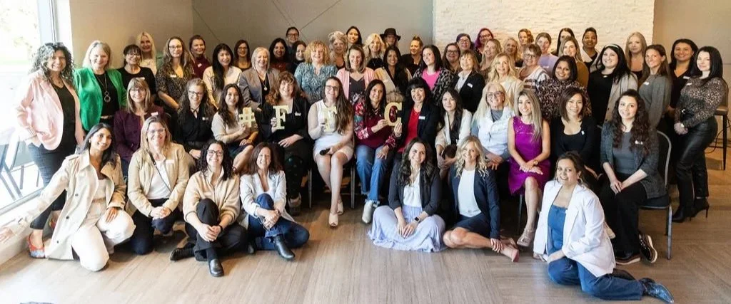 Female Forward Collective women gathered at event