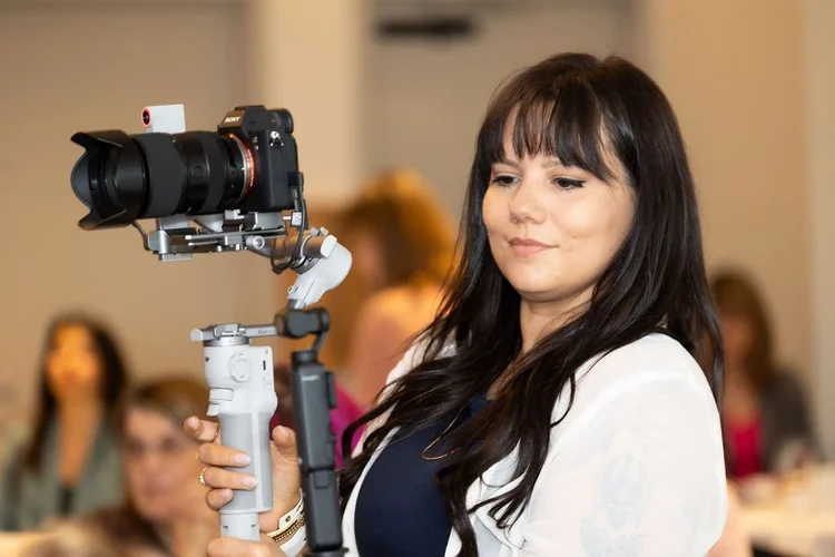 Guest at a headshot mini session at a Female Forward breakfast