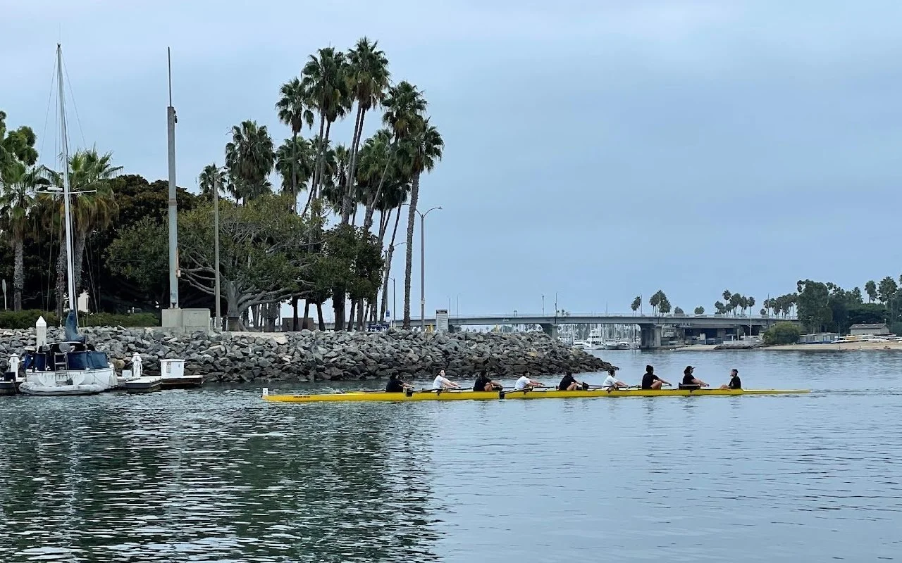 The women's crew eight at the finish of the Bay Series race.