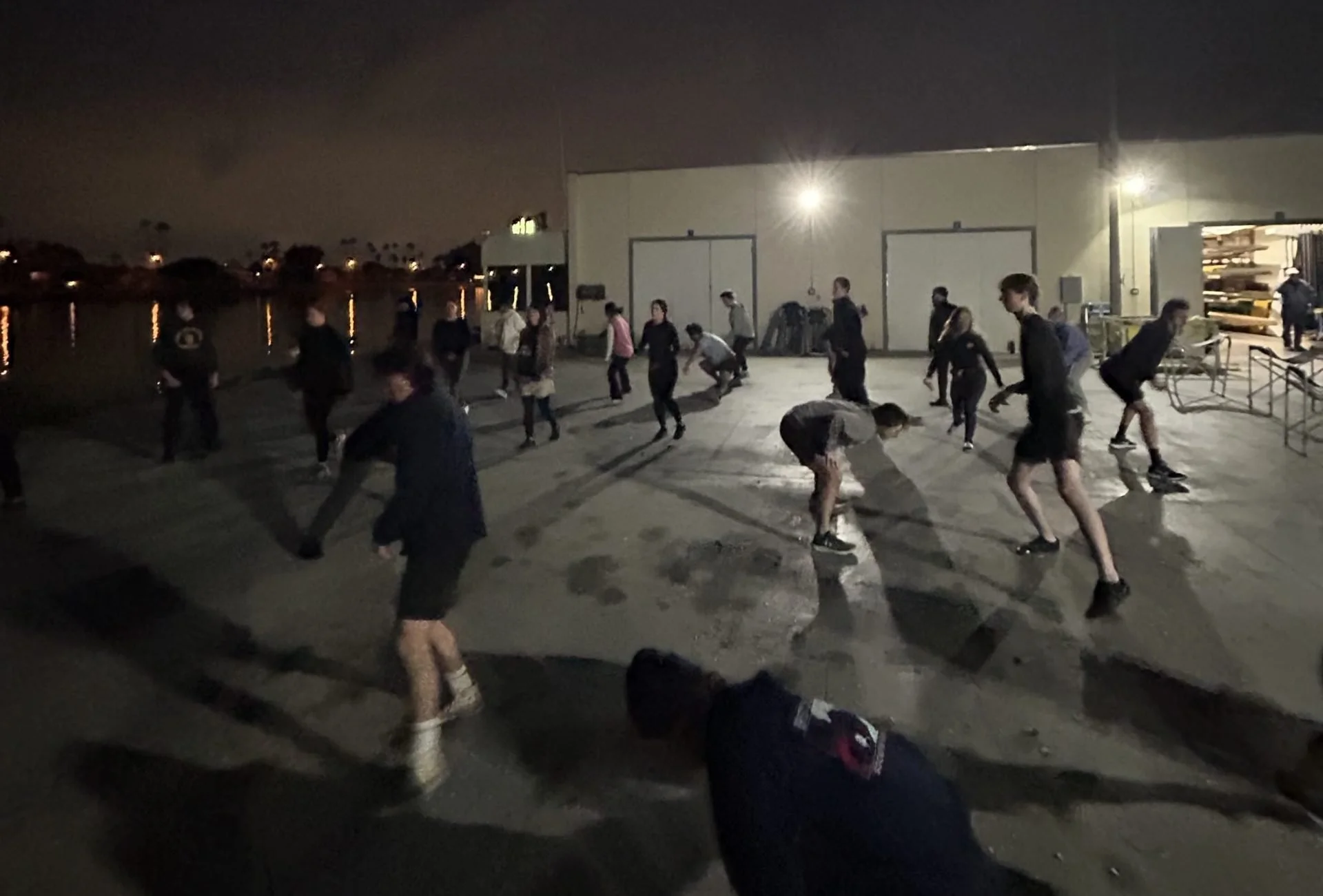 Beach Crew warms up together before land day practice.