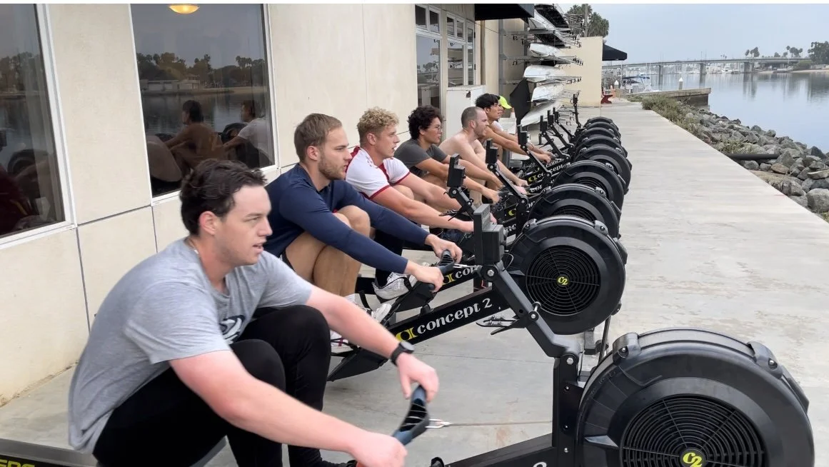 The varsity team during their erg workout. Gustav and Frederick are the second and third from left to right. 