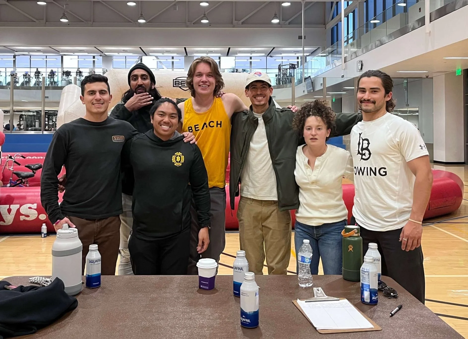 The Men's Crew pose for a picture at the Student Recreation and Wellness Center, photo by Mike